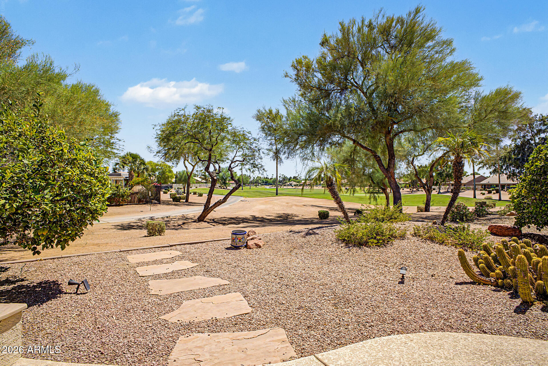 VERY POPULAR MONTERA MODEL w/GUEST CASITA, 2 CAR + GOLF CART GARAGE & GOLF COURSE VIEW in the GATED, ADULT community of Oakwood! The PRIVATE GATED COURTYARD entry leads to the Open Great Room, Den & Spectacular Kitchen w/Breakfast Nook, Island & Pantry. Spacious, SPLIT PRIMARY SUITE w/SITTING ROOM features DIRECT PATIO ACCESS, HUGE WALK-IN CLOSET & SEPARATE TUB & SHOWER. In addition to the Guest Bedroom & Bath in the main house, there is a 3rd Bedroom, Full Bath & Walk-In Closet in the CASITA. You'll find tons of extra Storage Space in the Laundry Room & Epoxied Garage. Enjoy entertaining overlooking your Mature Fruit Trees & the GOLF COURSE on the OPEN-VIEW COVERED PATIO & EXTENDED PATIO w/ BUILT-IN BBQ.  Don't miss this amazing opportunity to COME ENJOY THE GOOD LIFE in Sun Lakes!