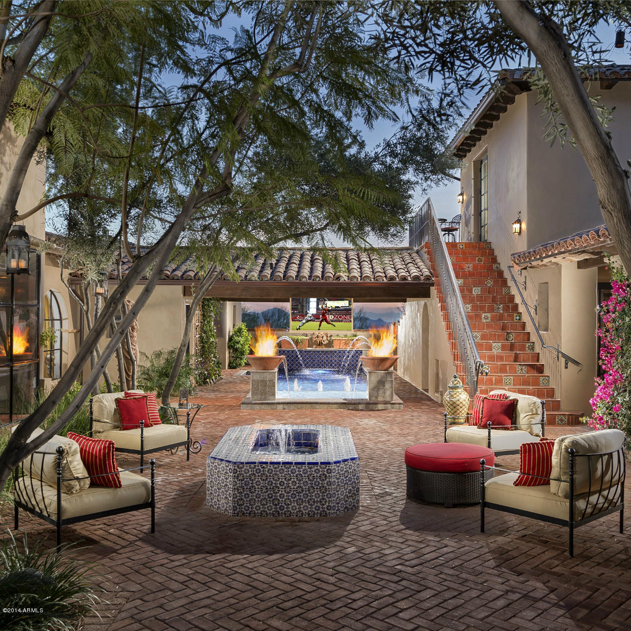 Located in the Park neighborhood of Silverleaf, this 8,000 sq ft. Spanish Colonial home is an icon. As the first home built in Silverleaf it is an authentic masterpiece, with exquisite timeless finishes and superior quality of construction. Sprawling across ¾ of an acre, the home was built for entertaining both inside and out. The expansive kitchen, all bathrooms, his and her closets, laundry room, and the addition of a guest casita overlooking the entire valley were just some of the features of a remodel in 2011. Enjoy the outdoor resort-like setting that features a new outdoor kitchen, putting green, spa and pool that includes an Endless Pools swimming machine, extensive dog run, multiple courtyards with three fireplaces, fire pit and five water features and a retractable flat screen tv. screen television in courtyard/pool area. And the home is a smart home with the most updated technology. It truly is a pleasure to behold in its authenticity and quality.