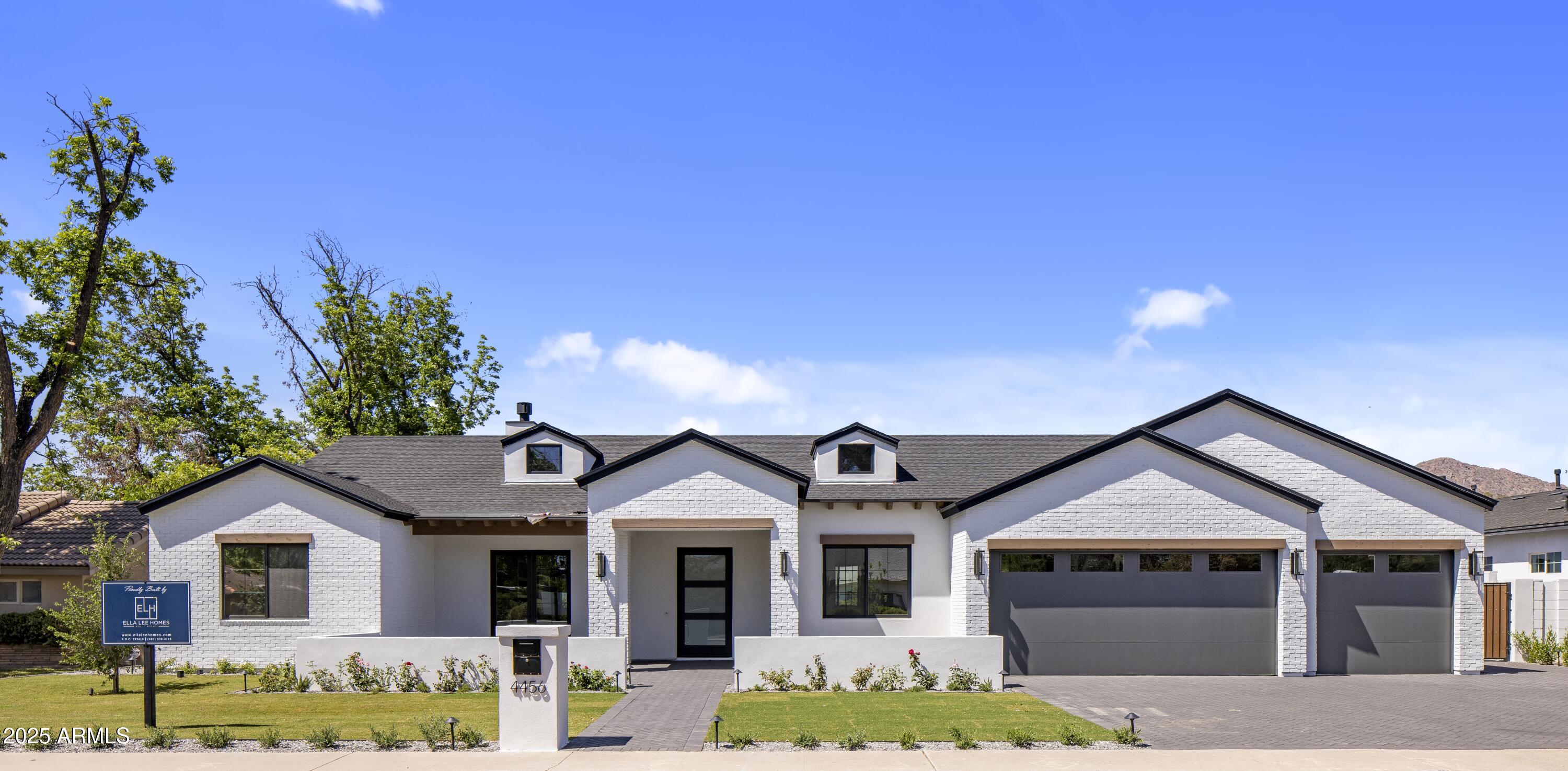 Welcome to Milco Development's newest offering—a modern Arcadia farmhouse on a half acre lot, thoughtfully designed with quality craftsmanship, timeless finishes, and today's most desirable features. Upon entry, a grand foyer leads into a light-filled great room with soaring vaulted ceilings and a wall of windows showcasing the beautifully landscaped backyard, sparkling pool, spa, and a pickleball court. This home offers room to live, entertain, and grow in a private yet welcoming setting. The highly appointed kitchen features a 10-foot island, Sub-Zero, Wolf, and Cove Appliances, under-cabinet lighting, and a large butler's pantry equipped with a coffee maker, additional beverage fridge, sink, and dishwasher—ideal for everyday living and elegant entertaining, made easier with Control4 Home automation. The open floor plan includes five ensuite bedrooms, each offering comfort and privacy. At the same time, the luxurious primary suite boasts a spa-like bath and an oversized closet with a custom center island. Additional highlights include 10-foot ceilings throughout the home, smart home pre-wiring, a spacious three-car garage, and exceptional indoor-outdoor living spaces designed for family gatherings, quiet evenings, and everything in between. Located on a charming street in the heart of Arcadia, this property offers new construction conveniences with enduring charm the neighborhood is known for.