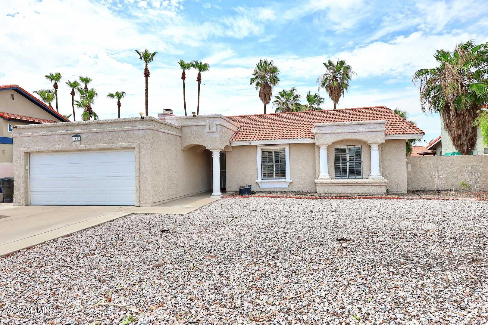 Welcome home to the popular Chandler Ranch community! This 3 bedroom, 2 bath, 1293 SF home is ready for its new family! Spacious great room floorplan with cozy fireplace, vaulted ceilings, and plantation shutters T/O! Kitchen features lots of cabinets and tile counters. Large primary suite with private bath, walk-in closet and private exit to the backyard. RV Gate, Oversized lot with covered patio and play pool in the backyard! NO HOA! Conveniently located next to lots of shopping, restaurants & entertainment with easy access to Loop 202 & US60!