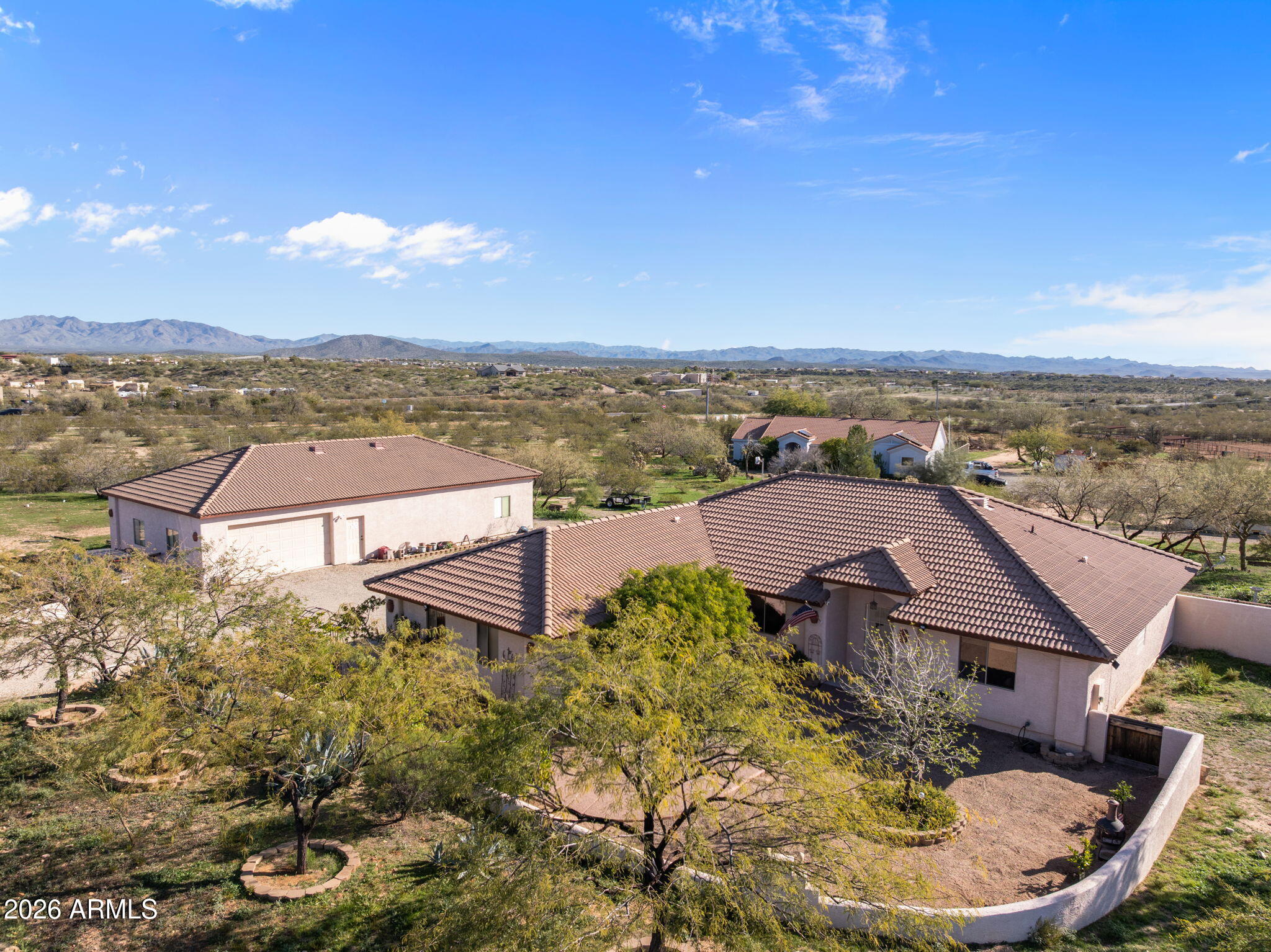 Welcome to your new home tucked away on a quiet street in Vista Royale.  This 2-acre property offers established landscape along with mature fruit trees, BRAND NEW HVAC system,  new tile and FRESHLY PAINTED INTERIOR.    Plenty of room for a horse set up if you desire.  The 1800 sq. ft. SHOP has water, power + its own septic system and mini split.  This  makes it  perfect for a mother-in-law Casita in addition to your AMAZING  workshop.   Home features 3BD 2BA + Den or office which can easily make a 4th BD if needed.  Spacious great room, open kitchen makes it easy to visit with family & friends.  So much potential for the grounds on the property too . Possibilities are only limited by your imagination!