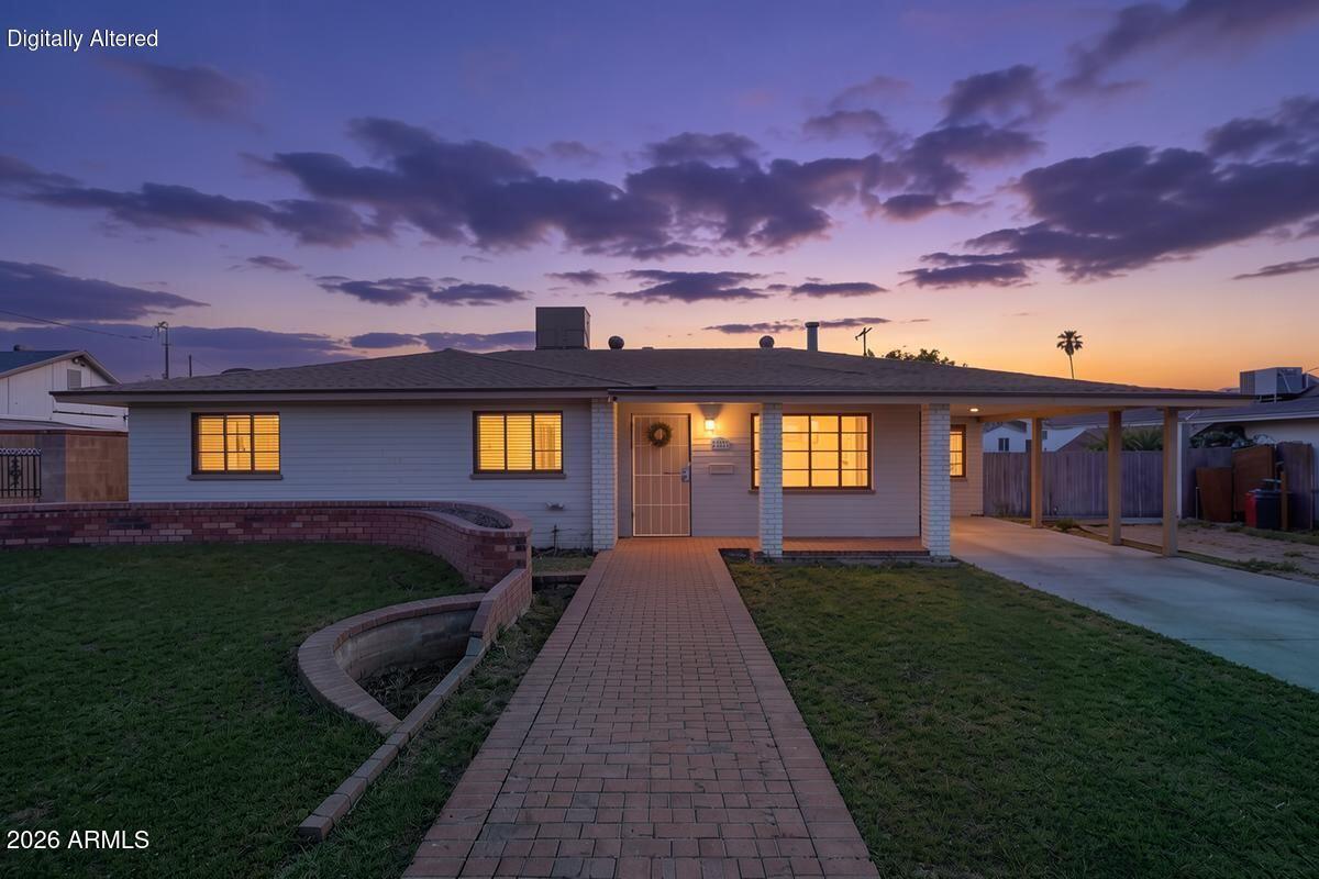 Over a third of an acre in Mesa under $400K -- that's the headline here, and the home delivers on it. This 3-bedroom, 2-bath property sits on an oversized lot with RV gate access, a detached garage, additional carport parking & an expansive covered patio built for the kind of Arizona evenings worth lingering over. Inside, 1,542 sq ft is laid out with a spacious living room, a breakfast area & a formal dining room flexible enough to serve as a dedicated home office. The kitchen has been updated with white shaker-style cabinetry, newer appliances & a large walk-in pantry. Both bathrooms are freshly updated, laminate wood-look flooring runs throughout, and a new water heater is already in place. All of this within minutes of Downtown Mesa's dining, boutiques, arts scene, and US-60 access.