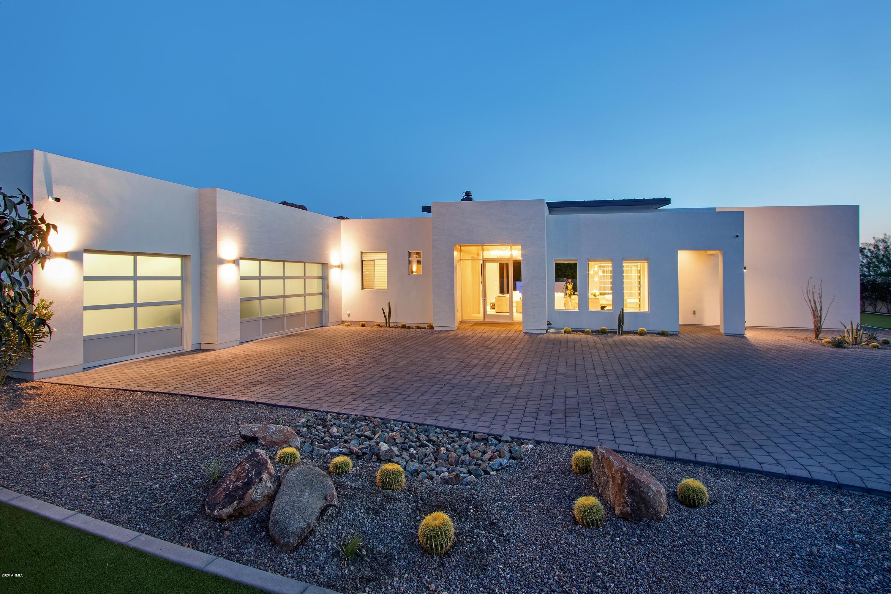 This is an incredible opportunity for a newer contemporary/transitional home in the nicest area of the Paradise Corridor!  The home features a great room floor plan with a stunning linear fireplace with a full wall of Italian stone, a gorgeous gourmet kitchen with all of the finest appliances, a huge island of porcelain, a separate wet bar and a double sided glass wine wall between the great room and formal dining area.  There are three bedroom suites at one end of the home as well as a TV/flex/game room and an office and expansive master at the other end.  The master features a main bedroom, updated three way fireplace and a sitting area.   The master bath features a stand alone tub, dual sinks with make up area in between as well a huge walk in shower.  His and her separate walk in closets as well.  The home also features a separate powder bath and large laundry room.  The backyard is a true oasis with a heated pool with bar seating, a separate spa with for sided spill over, as well as a step down firepit.  There is also a private electronic gate as well as a 3 car garage with epoxy and two large storage areas.  The home can also be purchased fully furnished under a separate bill of sale.   This home is truly an amazing opportunity for a home of this quality in this location and with these upgrades and finishes!
