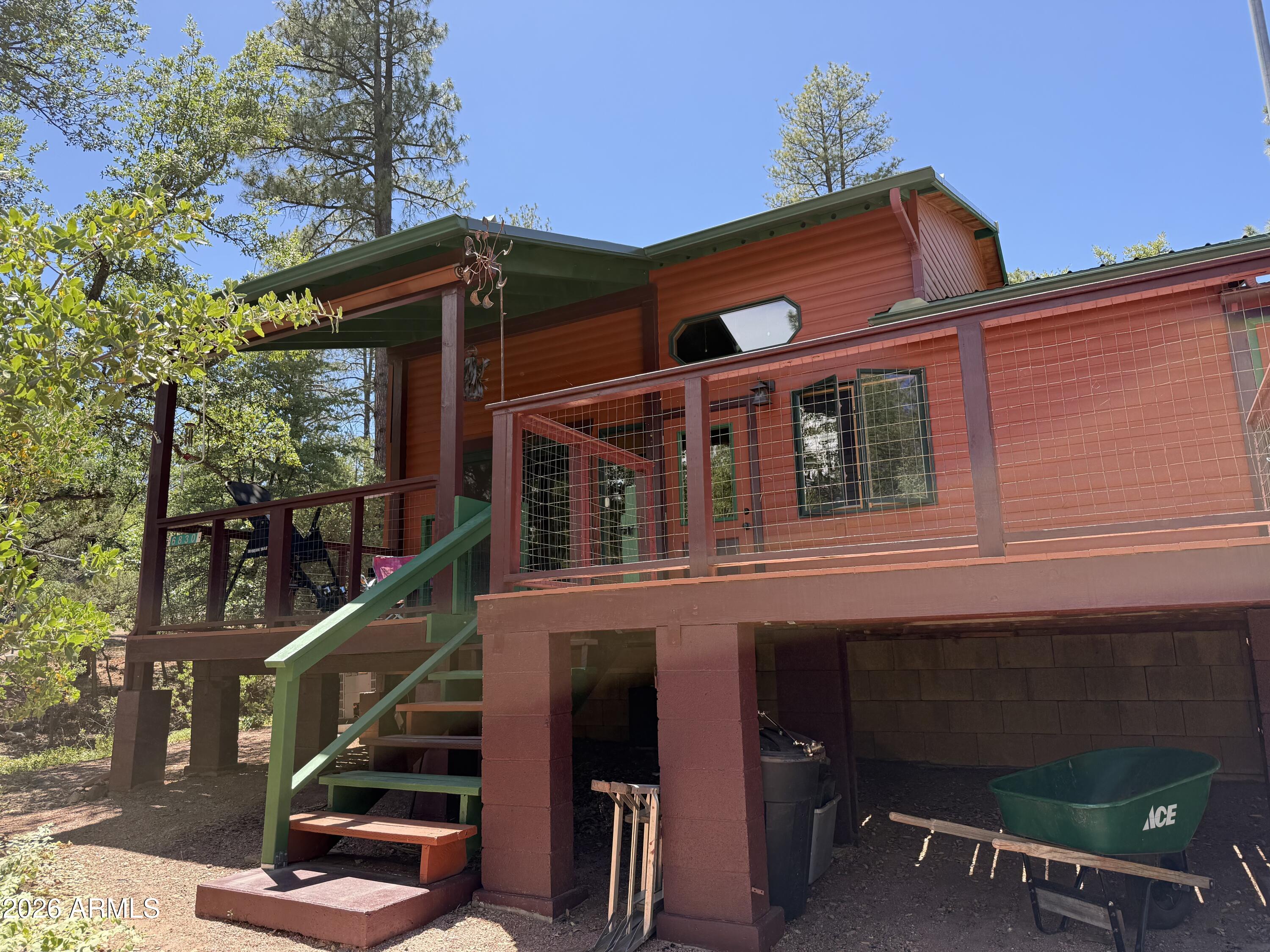 Check out this cozy year-round cabin home on 1/3 acre with a beautiful view of the Mogollon Rim in the Cool Pines neighborhood of Pine, Arizona. Enjoy moderate all-season weather, scenic location, NF trailhead 1blk away - tons of hiking/biking options, wildlife walking through the yard, and the relaxed atmosphere of the small twin hamlets of Pine-Strawberry.

Interior features include:
2 bedroom, 1 office/sunroom
central HVAC
fireplace 
vaulted ceiling living room with loft
kitchen w/ good number of cabinets & ample counter space
remodeled indoor bathroom
dual-pane windows throughout -- living room w/ wide view of the Mogollon Rim

Exterior includes: 
log panel siding,
large deck w/ view of the Mogollon Rim,
outdoor shower,
carport,
fenced area for small pets

And more, c