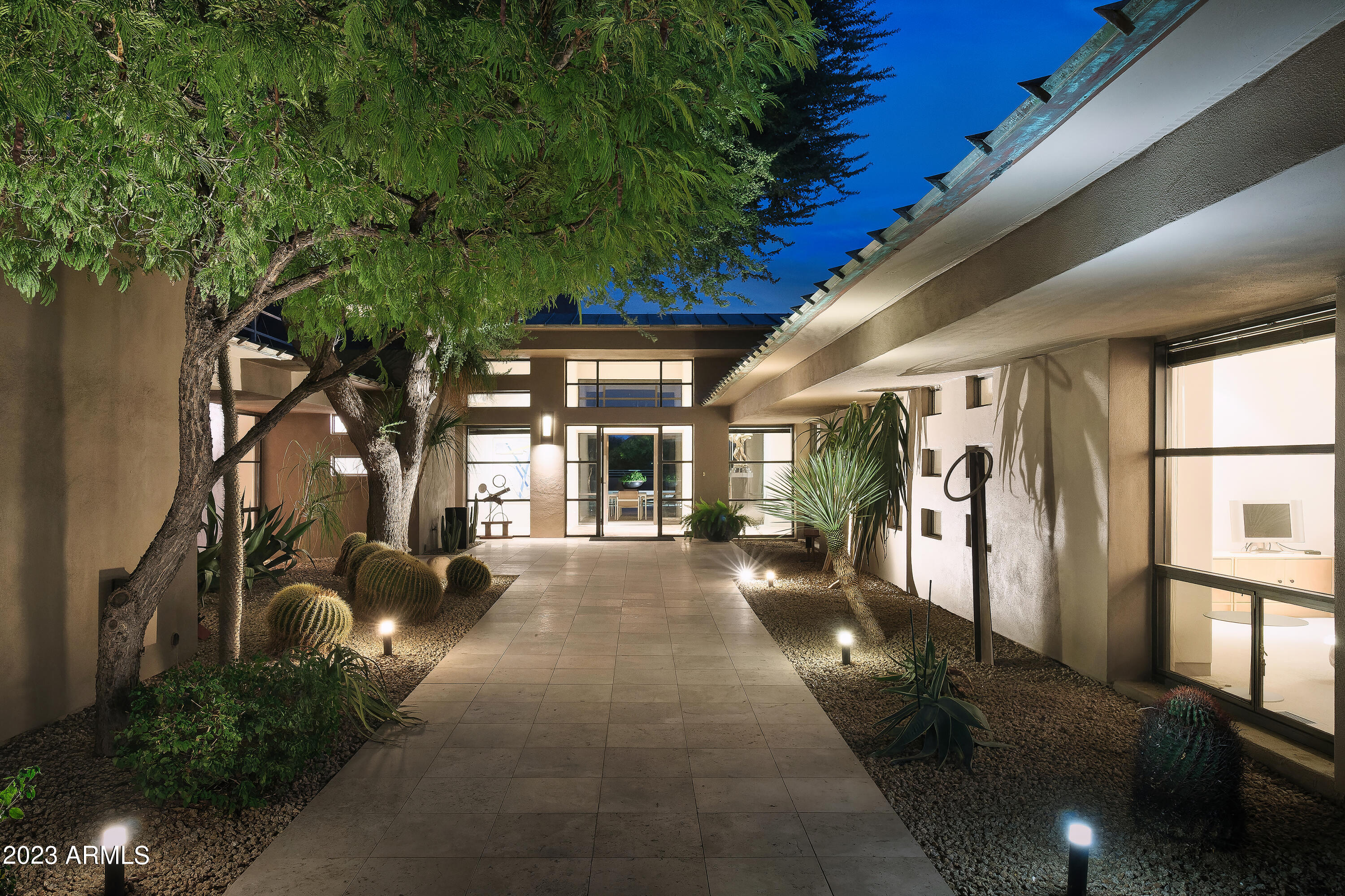 IMMEDIATE GOLF MEMBERSHIP AT CLOSING. One of a kind contemporary, exquisitely designed by Frank Lloyd Wright style protege Howard Madole. Surrounded by breathtaking mountain views and the beautiful Sonoran Desert. Large expanses of glass allow for sunlit living. Great room bordered by walls of glass, formal dining room, convenient kitchen with adjacent breakfast room and private patio to enjoy alfresco dining. Comfortable primary suite + 2 guest suites with ensuite bathrooms.  Large upstairs office/den with cozy fireplace with access to a view deck. Gorgeous outdoor living with meandering walkways encompassing the home, private patios and magnificent resort-like backyard with heated pool and spa, fireplace and BBQ. Designated a top 'Platinum Club of America'' golf club, Desert Highlands amenities include a Jack Nicklaus championship golf course, 18-hole putting course, award winning clubhouse featuring ''Jacks'' gastropub, state of the art fitness center, Highlands Racquet Club featuring grass, clay and pickleball courts, and more.  A $150,000 membership fee is due from buyer at close of escrow.