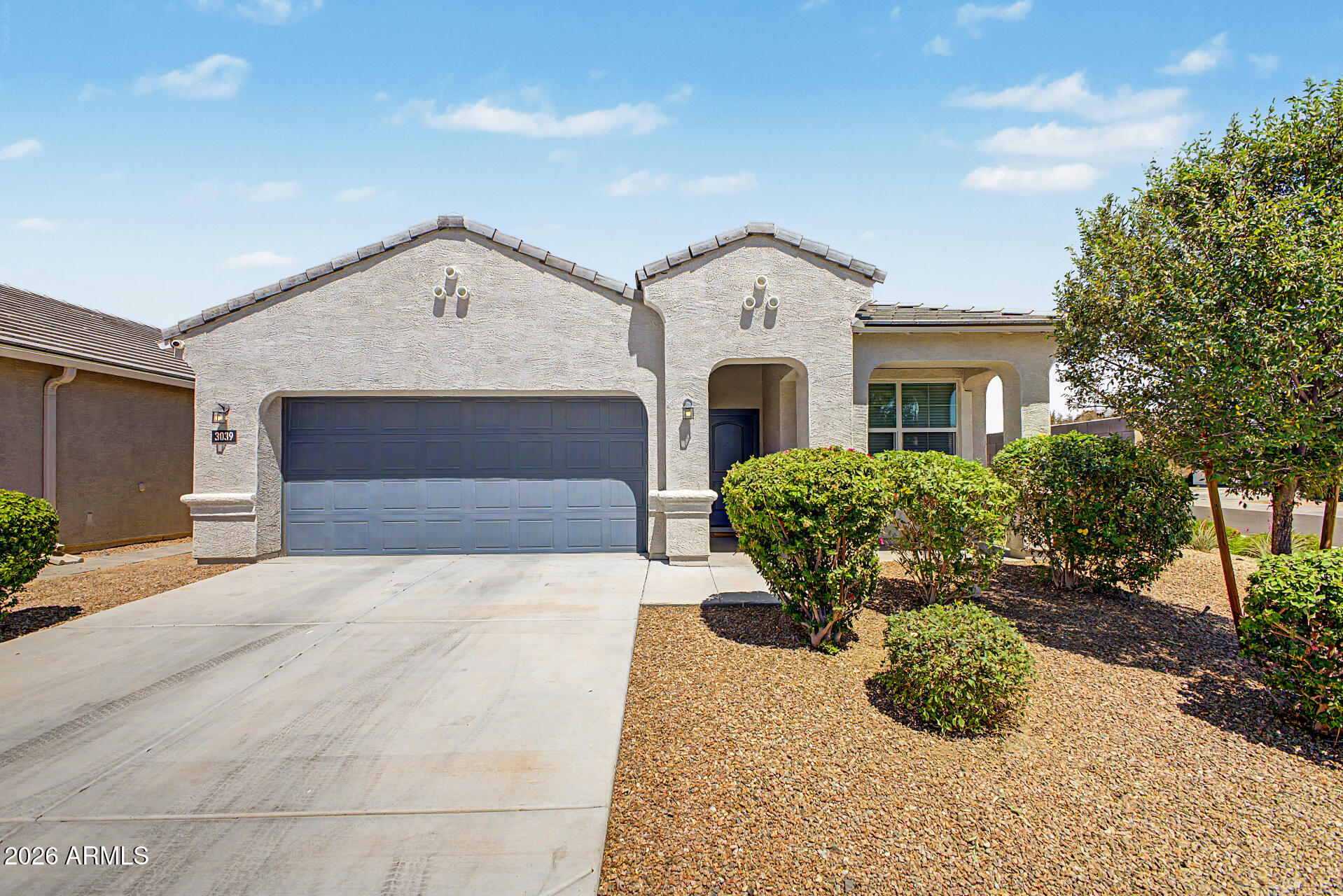 Like-new and move-in ready, this exceptional home in the gated community of Tuscano is priced well below comparable new construction in the area. Situated on a corner lot, the property provides generous indoor and outdoor living space. You will find 3 bedrooms inside, including a spacious primary suite and a versatile front flex room that can serve as a dining area, home office, or playroom. The open-concept kitchen is beautifully appointed with rich espresso cabinetry, granite countertops, and a large center island. The garage has been enhanced with a mini-split system, providing year-round comfort for hobbies or workouts Finally, the low-maintenance backyard offers endless possibilities, with room for a pool, gardens, or whatever else you can dream of.