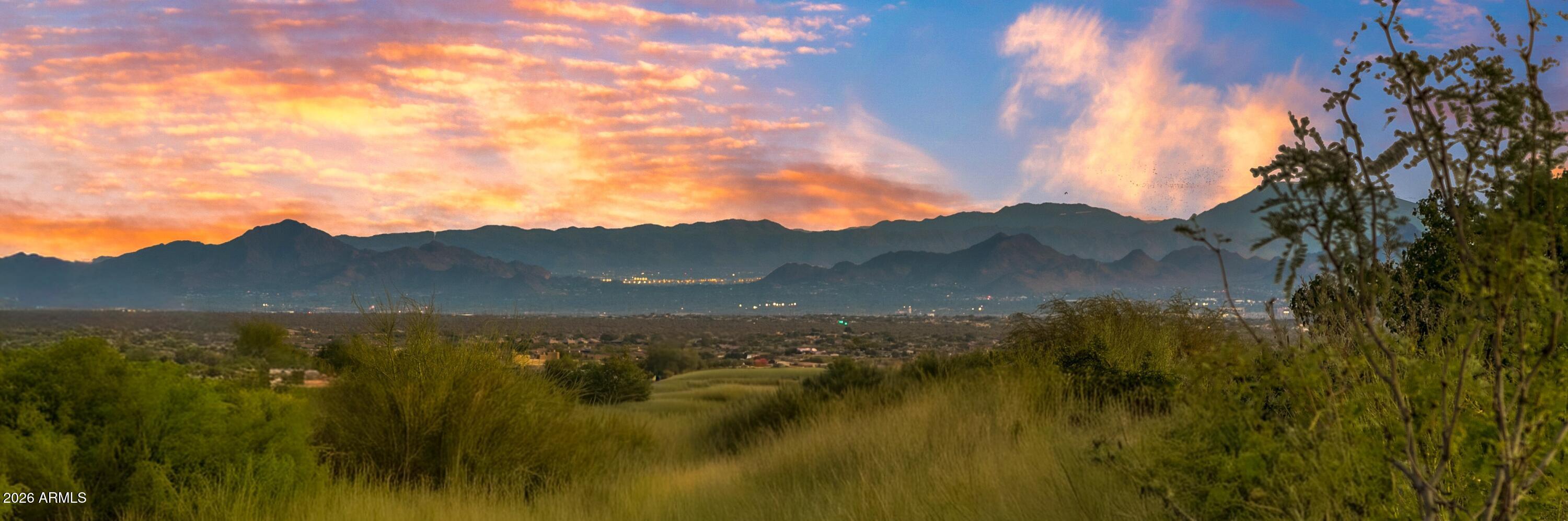Golf Membership Available- A Mountain Above the Rest -- Perched high on the mountain, this elevated desert contemporary is a rare convergence of location, lifestyle, and soul. Casual elegance flows effortlessly throughout - warm, open, and beautifully easy to call home.    
                         
Views That Stop You Cold -- Statuesque mountain peaks, blazing Arizona sunsets, shimmering city lights, and velvet black skies dusted with stars - the scenery shifts like a living painting from morning to midnight.  

Reimagined. Refined. Ready. -- Completely transformed with the freshest finishes and thoughtful design, every corner balances warmth and wow. Walls of glass dissolve boundaries between interior and the breathtaking Sonoran Desert beyond, while the open floor plan moves you naturally from one stunning view to the next.                                                                                          

Live, Gather, Celebrate -- The great room commands attention with a statement fireplace, floor-to-ceiling windows, and a sleek new wet bar - made for evenings worth remembering. The spectacular kitchen invites both the casual cook and the enthusiastic entertainer, with generous cabinetry and a linear island with bar seating that keeps the conversation flowing. The window-wrapped dining space places you right in the heart of the desert - in absolute style. 

Rest, Retreat, Recharge -- Tuck into the den with a good book or your favorite show. Four luxuriously appointed ensuite bedrooms - or three plus a private office - offer every guest and family member their own sanctuary of comfort and quiet.                                              

Outside is Everything -- The outdoor living experience is nothing short of spectacular - a newly built pool, alfresco dining with a built-in grill, a covered patio for sunlit lounging or twilight conversations, and a firepit made for stargazing as the desert evening glows all around you.    

Desert Mountain -- Where Life is Lived at Its Finest - Set within the legendary community of Desert Mountain, this home places you at the pinnacle of Sonoran Desert living. Seven championship golf courses, seven stunning clubhouses, world-class dining, and over 20 miles of private trails along the Tonto National Forest await. All within easy reach of Scottsdale's celebrated cultural scene, premier shopping, and Phoenix Sky Harbor International Airport. This is not simply a home. It is a statement -- where effortless living, natural grandeur, and architectural brilliance converge in one of Arizona's most extraordinary communities.