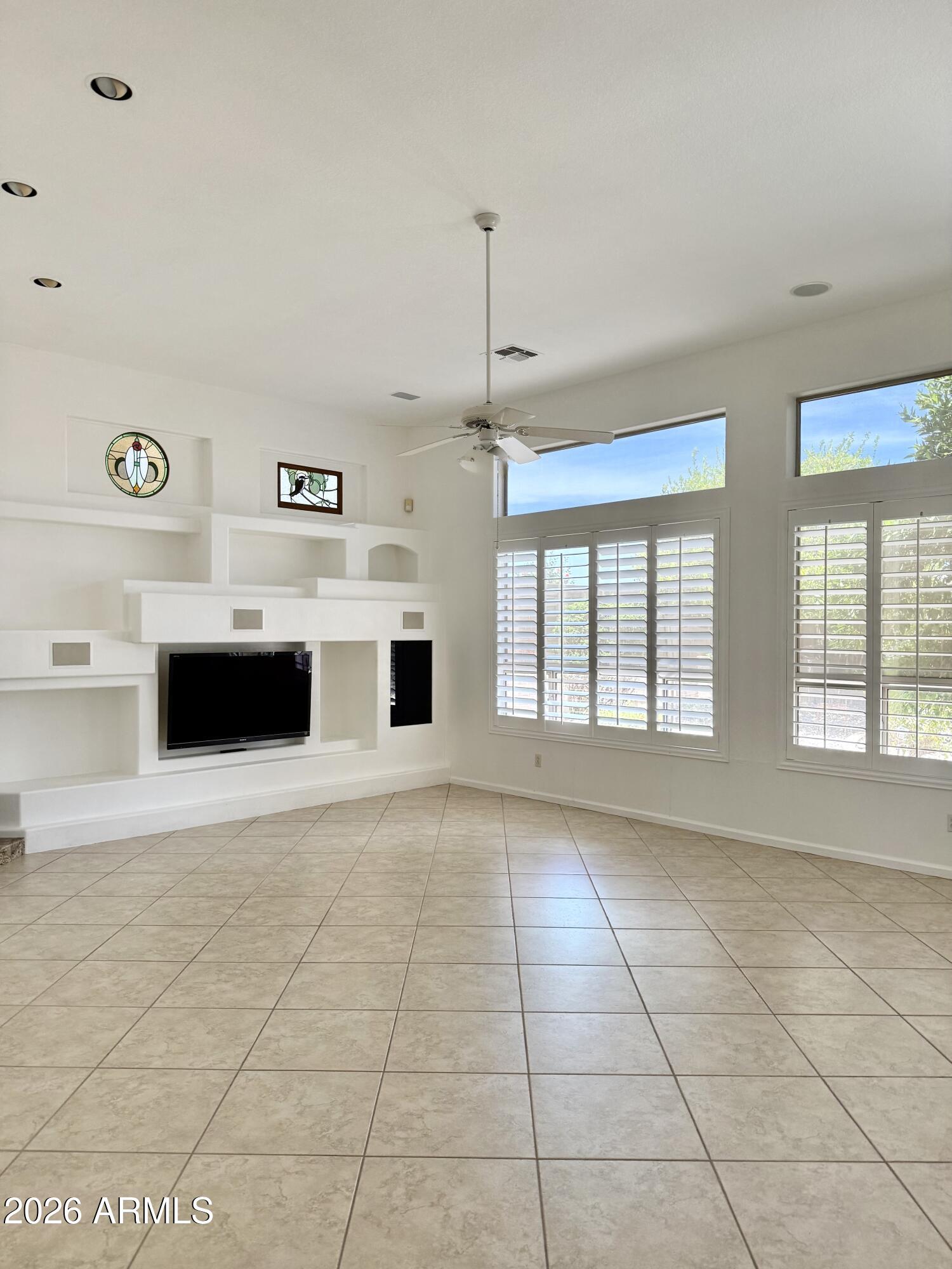 Located in the coveted 85254 ''Magic Zip Code'' in the highly desirable Triple Crown community offers the perfect combination of a Scottsdale address, Phoenix taxes, and Paradise Valley schools. Featuring approximately 3,175 sq. ft., 3 bedrooms, 3 full bathrooms, a dedicated office, a separate library with built-in bookshelves and a 3-car garage, this spacious single-level floor plan is ideal for both everyday living and entertaining. Recent upgrades include a new roof, new HVAC system, fresh exterior paint, and plantation shutters throughout. Enjoy a private backyard with a sparkling pool, north/south-facing lot with no neighbors directly behind, providing added privacy and tranquility. A prime location just minutes from Kierland Commons, Scottsdale Quarter, Desert Ridge and, WM Golf.