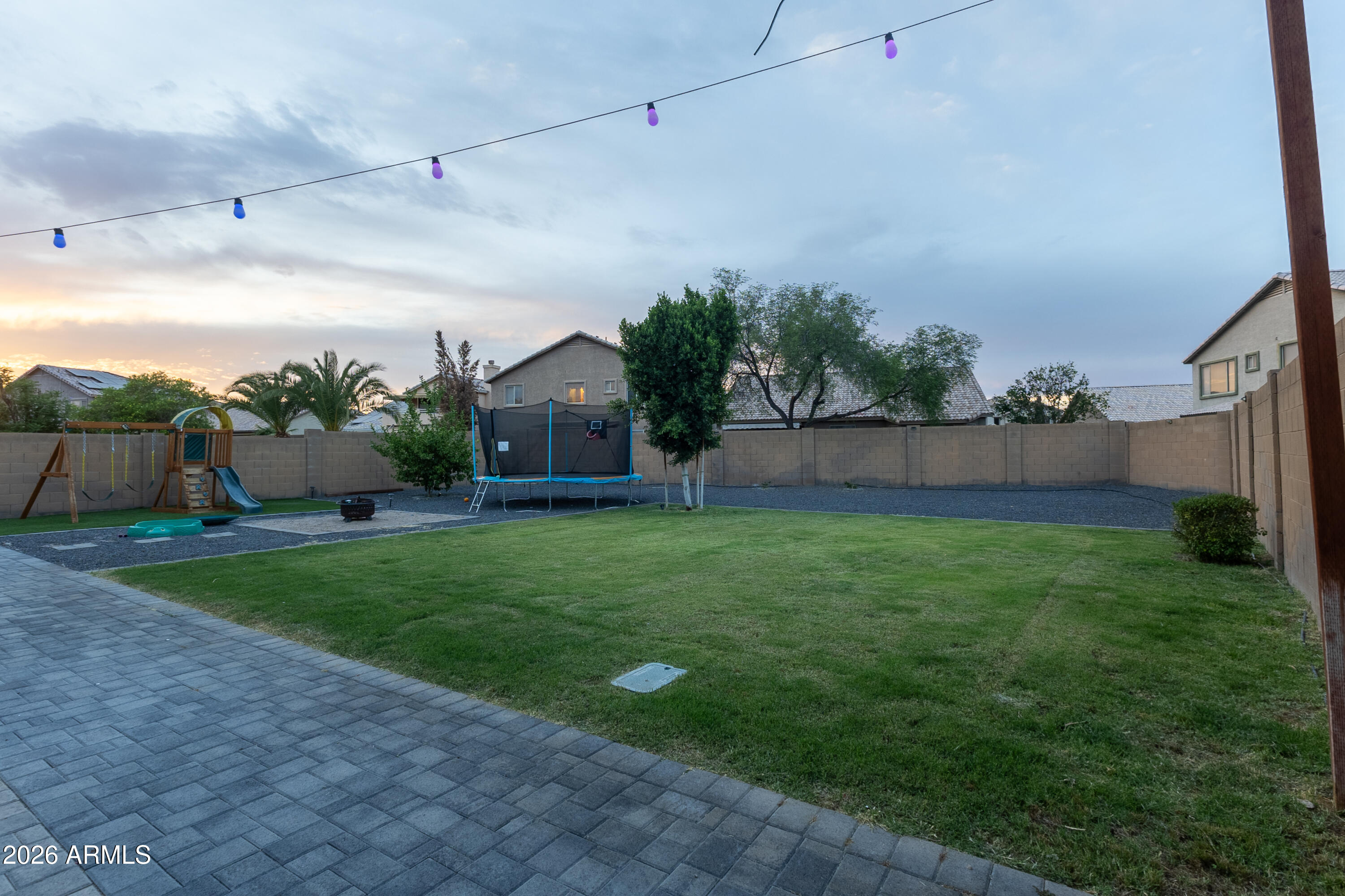 Motivated Sellers! This beautifully upgraded home is in the heart of Surprise! Situated on a HUGE LOT in a desirable family neighborhood, this 4bd+Den home offers the perfect blend of comfort, style, & outdoor living. Inside, you'll find a fully upgraded interior with vaulted ceilings, modern finishes, an open & functional layout, thoughtful touches throughout and Energy Efficient Solar Panels. The backyard is an entertainer's dream featuring an extensive outdoor package with plenty of space to relax, play, and enjoy Arizona living year-round. Conveniently located near parks, schools, shopping, and dining, this home checks all the boxes for families, entertaining, and everyday living. Sellers are updating all interior & exterior paint & upgrading the kitchen backsplash.