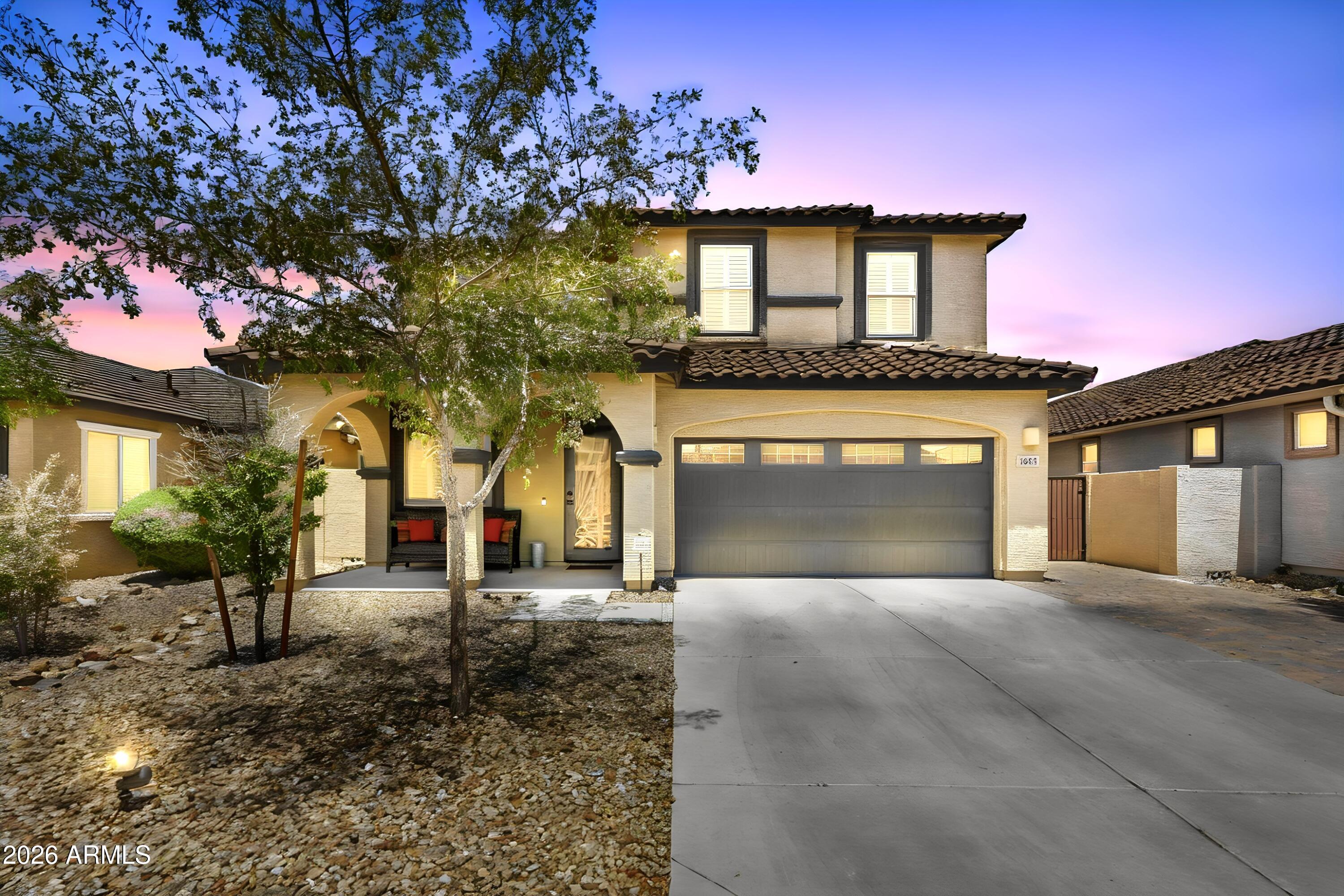 Welcome to this exceptional 5 Bed/3 Bath home in the gated Rock Springs community, featuring over $250,000 in upgrades to the home & backyard. A main-level Bedroom & remodeled full Bath are perfect for guests or multigenerational living. The open-concept floor plan features a thoughtfully remodeled Kitchen with quartz counters,  black GE appliances & range hood.  Home also includes Family Room with feature wall, versatile Loft & expansive Primary Suite. The Resort Style Backyard is designed for entertaining! Covered paver patio, turf area, & travertine decking. PebbleTec saltwater pool with Baja shelf & swim-up bar to the covered outdoor kitchen. Gather around the firepit and enjoy mountain views. RV gate and expanded paver driveway. Minutes from shopping, dining, Lake Pleasant, & Loop 101
