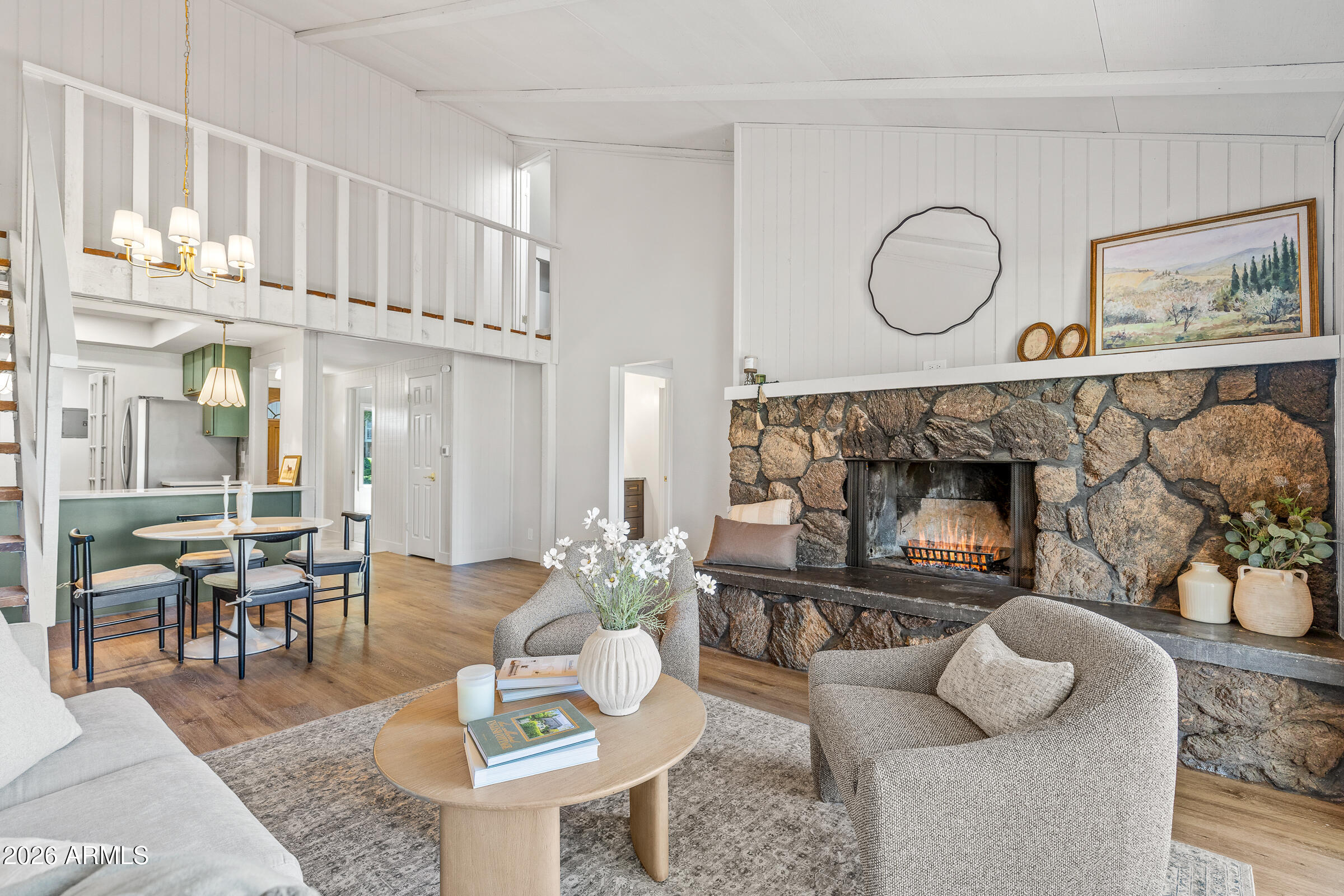 Welcome to your mountain retreat nestled along the 9th fairway of Continental Country Club in Flagstaff. This beautifully remodeled 2-bedroom, 2-bathroom home with an additional loft offers the perfect blend of modern luxury and classic mountain charm.

Enjoy breathtaking views of the San Francisco Peaks along with panoramic golf course vistas overlooking holes 1, 2, 3, and 9. Inside, every detail has been thoughtfully updated. The stunning kitchen features timeless shaker-style cabinetry accented by elegant Taj Mahal quartzite countertops, creating a sophisticated and inviting space for entertaining. The spacious living room is anchored by a dramatic fireplace, offering the perfect setting for cozy evenings after a day on the course or exploring Northern Arizona. Beyond the exceptional cosmetic updates, this home provides true peace of mind with extensive mechanical and structural improvements already completed. Major upgrades include new floor joists, a new furnace, water heater, updated valves, and numerous system enhancements designed for years of worry-free ownership.

Whether you're seeking a full-time residence, a seasonal escape, or an investment opportunity, this move-in-ready property offers an unparalleled lifestyle in one of Flagstaff's most desirable golf course communities. Don't miss the opportunity to own a fully renovated home with some of the best golf course and mountain views Continental Country Club has to offer.