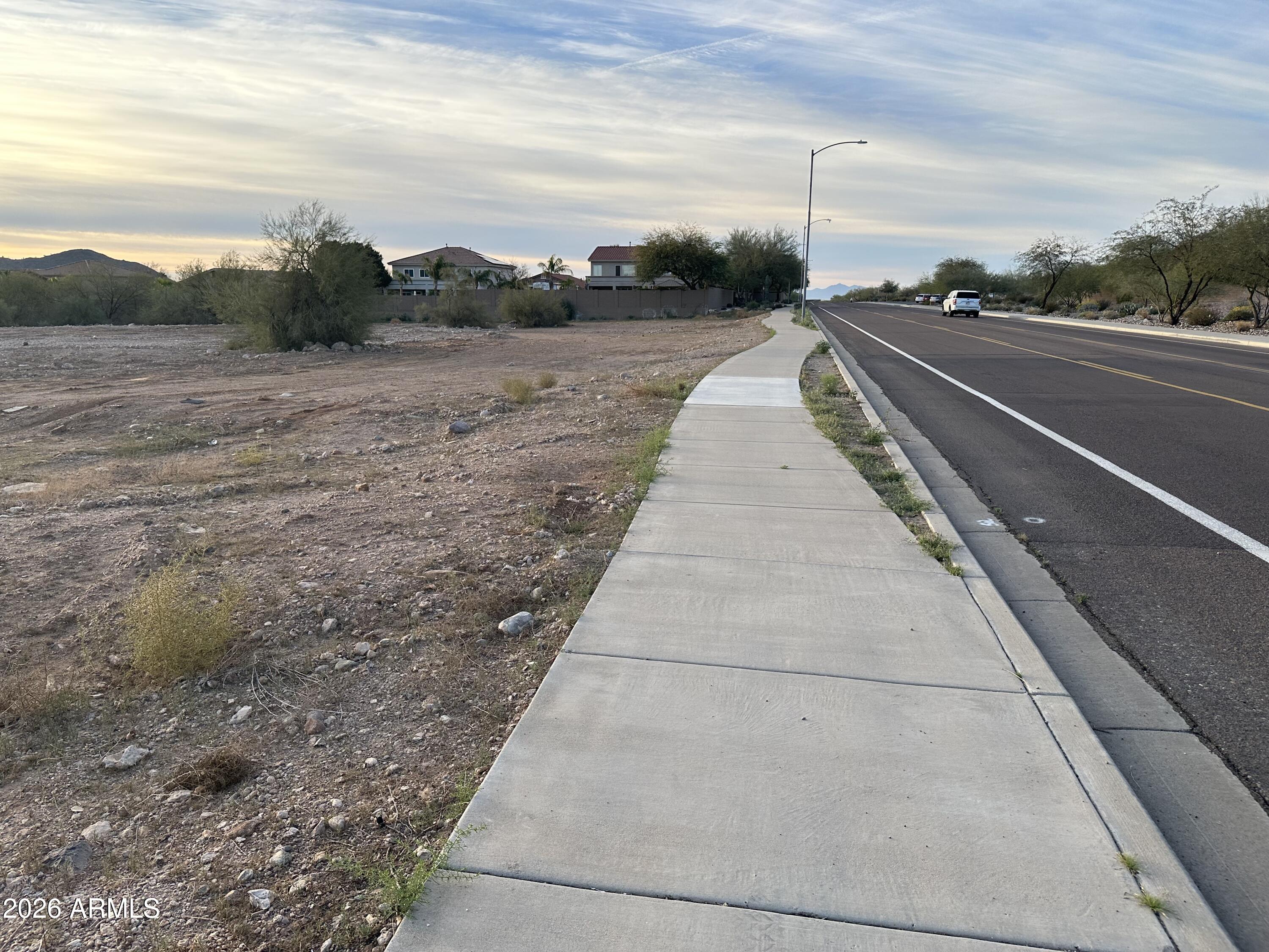 4 Lots available in City of Peoria. READY TO BUILD!! CUSTOM MULTI-MILLION DOLLAR HOMES TO BE BUILT!! Each Lot .64 acres (28,000 sq ft each lot). Each lot is almost square (165 ft by 170 ft).  Lots are level and easy to build. Mountain views all around. Close to Biking and Hiking Trails. Sidewalk on 99th ave already done with street lights. Great Location !! Great Access !! 99th Ave Frontage!! All utilities on Site - Water, Sewer & Gas. Close to best schools. Within 10 mile radius from TSMC. Million dollar custom homes in the area.
Perfect lot size to build your own custom home. North/South Orientation. 
No HOA !! Low Property Taxes !!