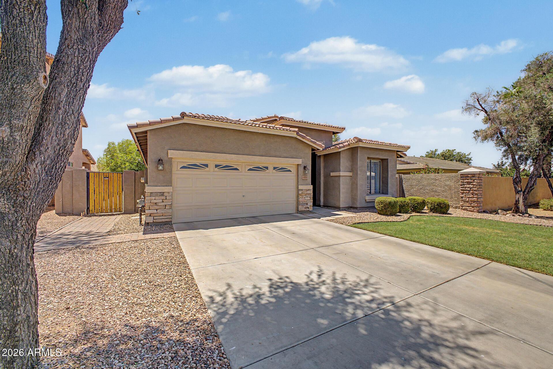 Nestled in the sought-after Seville community, this beautifully updated single-level home offers thoughtful improvements throughout. Fresh interior paint enhances the bright, welcoming feel of the home, while modern upgrades create true move-in-ready convenience.
At the heart of the home, the updated kitchen features black stainless steel appliances, a reverse osmosis system, and quartz countertops. The upgraded soft-close cabinetry and drawers extend throughout the home, offering a cohesive, finished look.
The spacious primary suite is complete with an updated bathroom, walk-in closet, and direct access to the backyard. Outside, you'll find plenty of space to play and room to relax under the covered patio while enjoying Arizona's colorful sunsets. Additional updates include a newer HVAC system, water heater, water softener, and solar screens, offering enhanced privacy and improved energy efficiency.
Conveniently located near highly rated schools, shopping, dining, and parks, this home combines an ideal location with upgrades ready for immediate enjoyment.