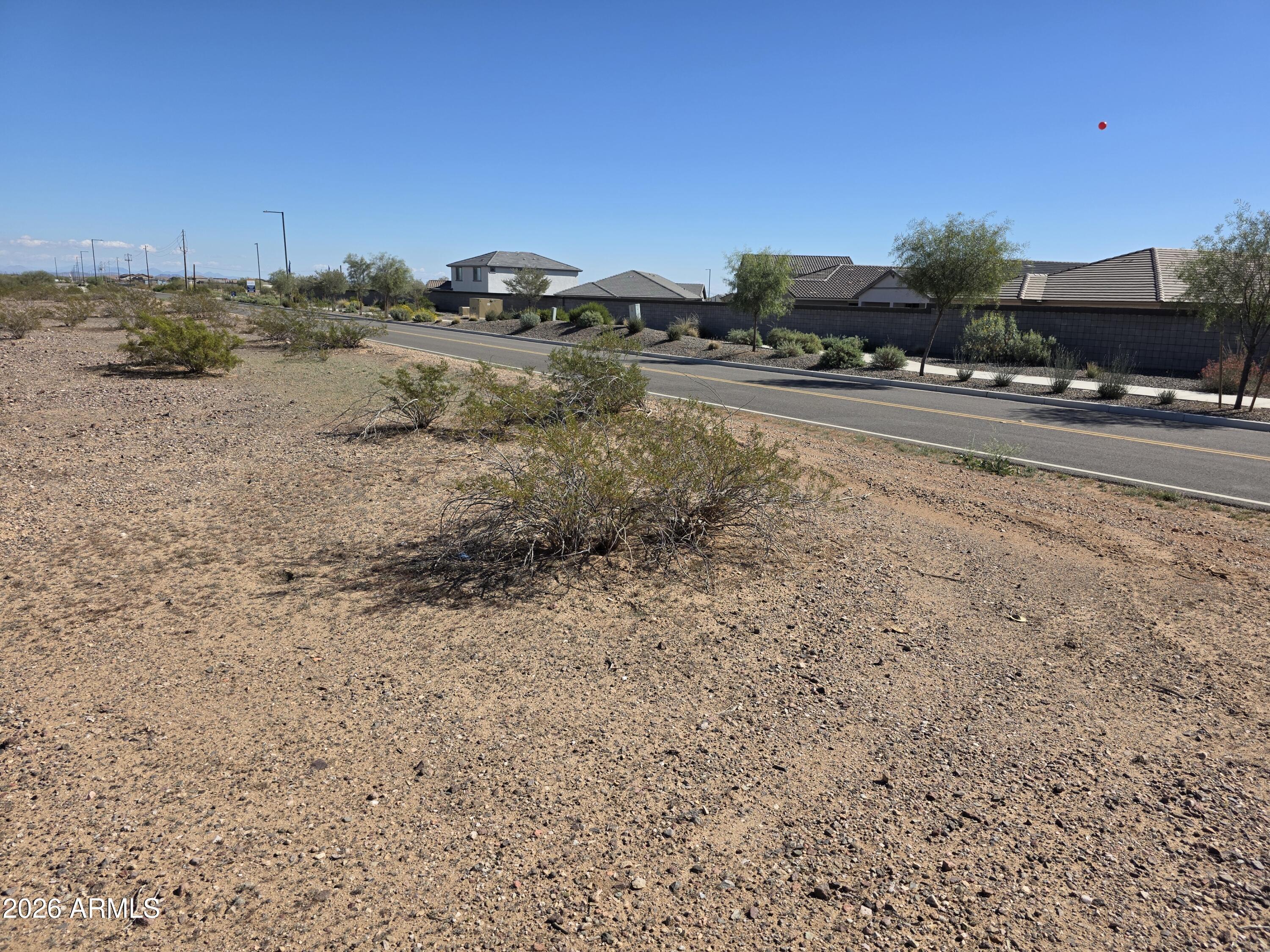 Great parcel to have your ranch, to split, or keep for future potential appreciation. Close to the City of Surprise and in the direction of its growth. 18 acres on paved road with great potential adjacent to new home subdivisions on adjacent properties across the street on Pinnacle Peak Rd and on the NE side of the parcel. Part of property is in the flood plain.