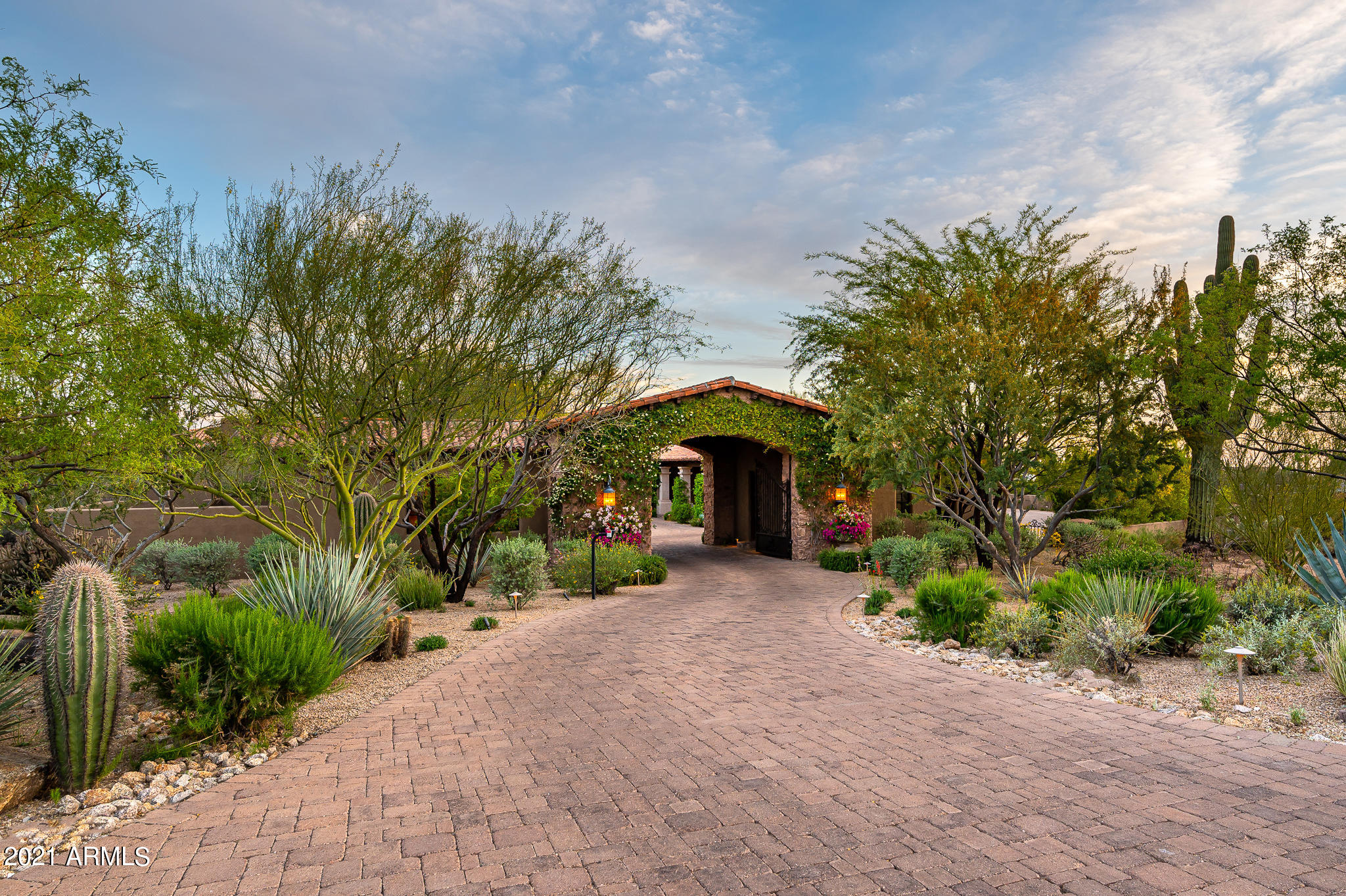 *Secluded Mediterranean estate, sited on 2.5 acres, located in the guard-gated community of Whisper Rock Estates * The gated portico provides an incredible welcome to the inner motor court with lush landscape & hand-carved cantera  fountain * The main home offers a versatile floor plan with owner's suite completely separate with adjoining office, formal living & dining spaces, large kitchen opening to a grand family room * The guest wing has two generous bedrooms with en-suite baths & access to the front courtyard * Temperature-controlled wine room * Full-size bar in the Family Room complete with ice machine, d/w & fridge * One-of-a-kind owner's suite with sitting room, fireplace, completely separate His & Hers baths, closets and toilet rooms *Full Crestron home automation * 80,000 GZ Generator for backup power * The casita provides ample privacy for long-term guests * A backyard designed for both serenity & entertainment: Generous covered patios, multiple fireplaces, rose garden, large grass areas and mature landscape, pergola with fireplace, built-in BBQ island and heated pool & spa * 4-car garages complete the residence * Furnishings by Wiseman & Gale can be purchased separately * The adjoining 2.5 acre lot can be purchase separately to create a 5+ acre estate *
