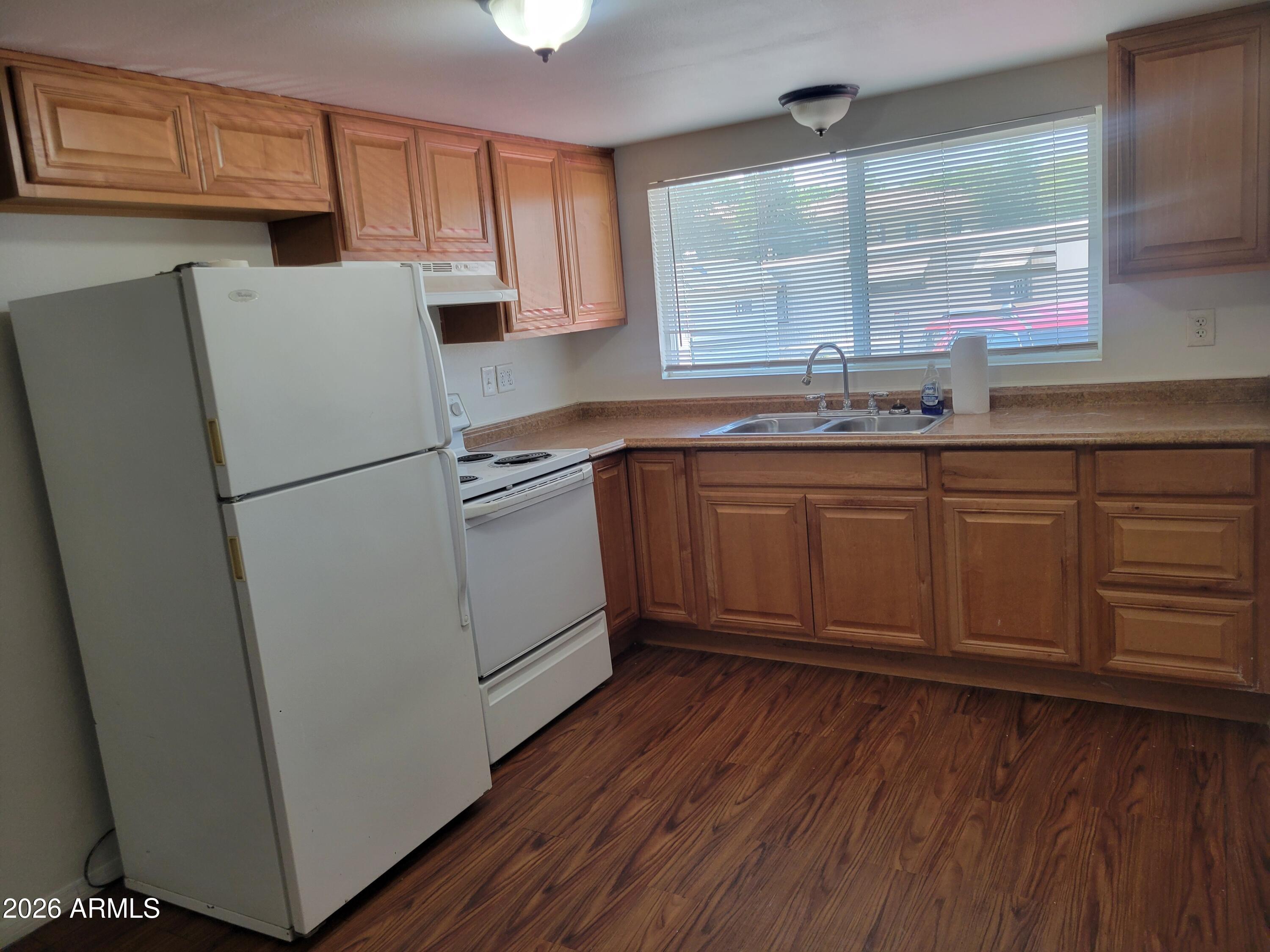 **NEW AC in 2025!** Charming one bedroom home, in the all ages community of Southern Palms. This home has hard floors throughout, and in unit washer/dryer, and a covered patio area! Enjoy the central location to shopping and restaurants!