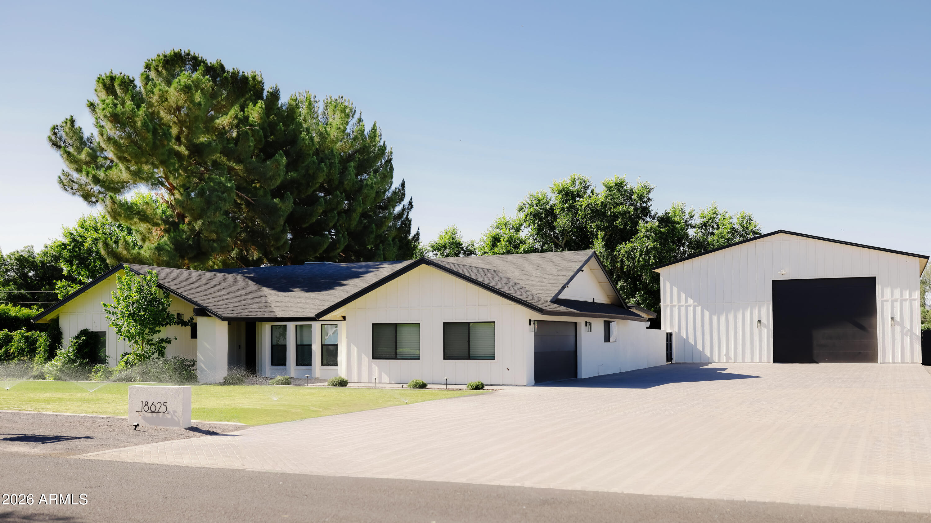 This is the one you've been waiting for. A fully remodeled horse property on a premier north-facing lot in Queen Creek. 2300 soft home with a 2300 sqft shop. $600K in upgrades, no detail overlooked, move-in ready from day one.
From the moment you arrive, the manicured lawn, extended driveway, and clean curb appeal set the tone. Step inside and the open-concept layout opens up with soaring vaulted ceilings, recessed lighting, and wide-plank wood-look flooring that flows through every room. Solid wood doors throughout add a level of craftsmanship you simply don't find at this price point.
The chef's kitchen is the heart of the home anchored by a 48'' professional range and a built-in 60'' refrigerator/freezer, wrapped in quartz countertops with matching backsplash, crisp white shaker cabin and stainless steel appliances. A generous walk-in pantry, an attached butler's pantry, and a center island with breakfast bar make this kitchen as functional as it is stunning.
The primary suite is a true retreat, featuring an ensuite with double sinks and a spacious walk-in closet. With three additional bedrooms offer room for family, guests, or flexibility. New windows flood the home with natural light while keeping energy costs in check.
Then there's the shop and it's a game-changer. Fully spray foam insulated and climate-controlled with two 3.5-ton AC units, this space is ready for serious work or serious play. Combined with the attached 2-car garage, you have parking for 10 vehicles total. A dedicated 300 sq ft office/loft provides the perfect work-from-home setup.
And for the horse enthusiast: flood irrigation is already in place, making this lot as practical as it is beautiful.
Properties like this with this level of finish, this much garage/shop space, and horse property irrigation rarely come to market in Queen Creek. Don't wait.