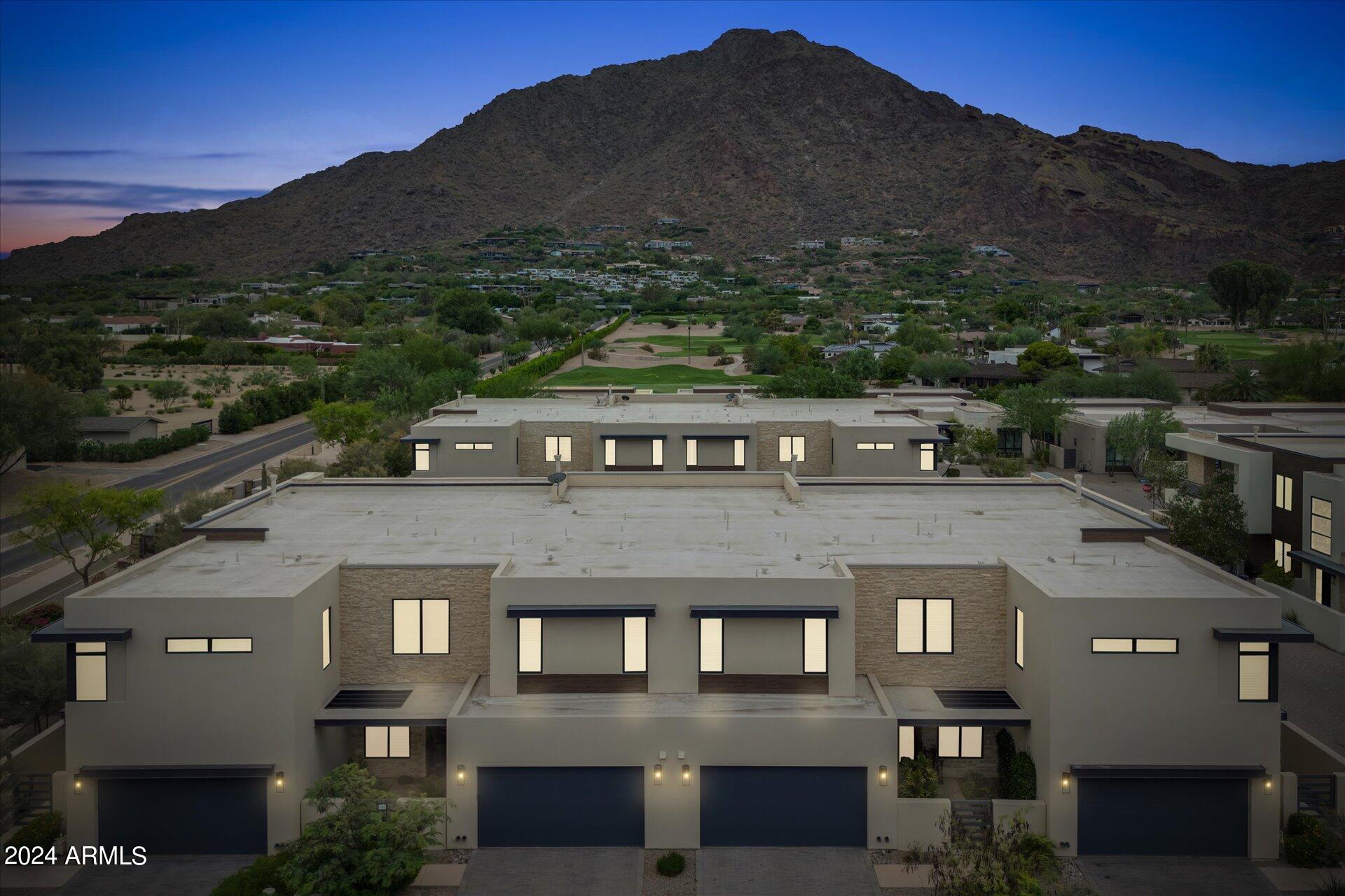 Camelback View. Enjoy resort living w/ full amenities at adjacent Mountain Shadows resort combined with distinct architectural designs. Enjoy views from 800+ sq. ft. outdoor deck. This Villa has 20 ft. high entry foyer with private elevator/stairs to living level. Luxurious designer features include, Wolf combo dual fuel range oven and microwave, Sub Zero refrigerator, Asko dishwasher, Zephyr hood,10 ft. high ceilings, 9 ft. bi-fold doors to deck, 9 ft. bi-fold from primary suite to deck,  indoor/outdoor fireplaces, Crestron smart home, Lutron lighting, motorized shades, surround sound, 24 hr guarded entry, & more!  Includes membership in Citizen's Club at Mountain Shadows - fitness center, classes, signing privileges, golf, discounts on all retail services, including food, rooms, golf.