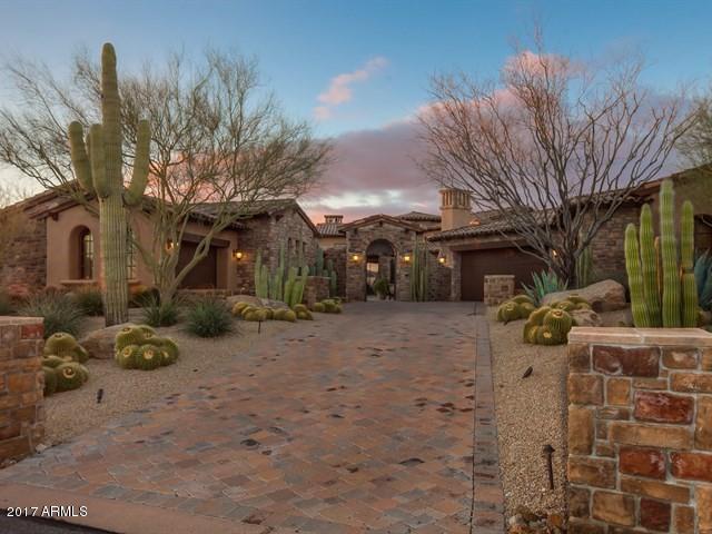 This home lives perfectly for 2 people or easily can accommodate 200 people for a party. You won't believe what awaits you as you open the massive iron gate leading to a front courtyard with a beautiful pool and spa that is completely private. The incredible views of the golf course and Continental Mtns. will make your jaw drop as you enter the home. Two large sets of automated pocket doors opens the great room to the immense covered back patio and also the front courtyard and pool. Another pocket ''window'' behind the kitchen sink opens up to form an outside eat in kitchen bar. The floor plan is split with the master and office on one side and the two guest rooms on the other. Absolutely one of the finest homes in north Scottsdale. Custom furnishings available under separate agreement. Other amazing amenities include: 

- Separate 2 room casita with sitting area, king bedroom, laundry and kitchenette with cook top, sink, refrigerator/freezer, microwave and convection oven plus an attached garage.

- 20' tray ceilings in great room.

- Gas firepit in back is ideal of watching the amazing AZ sunsets.

- Outdoor fireplaces and TV's in courtyard and backyard.

- Giant outdoor kitchen with gas grill, sink, refrigerator and storage. 

- Misting system.

- More storage than you could ever use.

- Furnishings were custom made for the house and coordinate beautifully with the window treatments.

- Surround sound speakers throughout the home. 

- Must see to fully appreciate.
