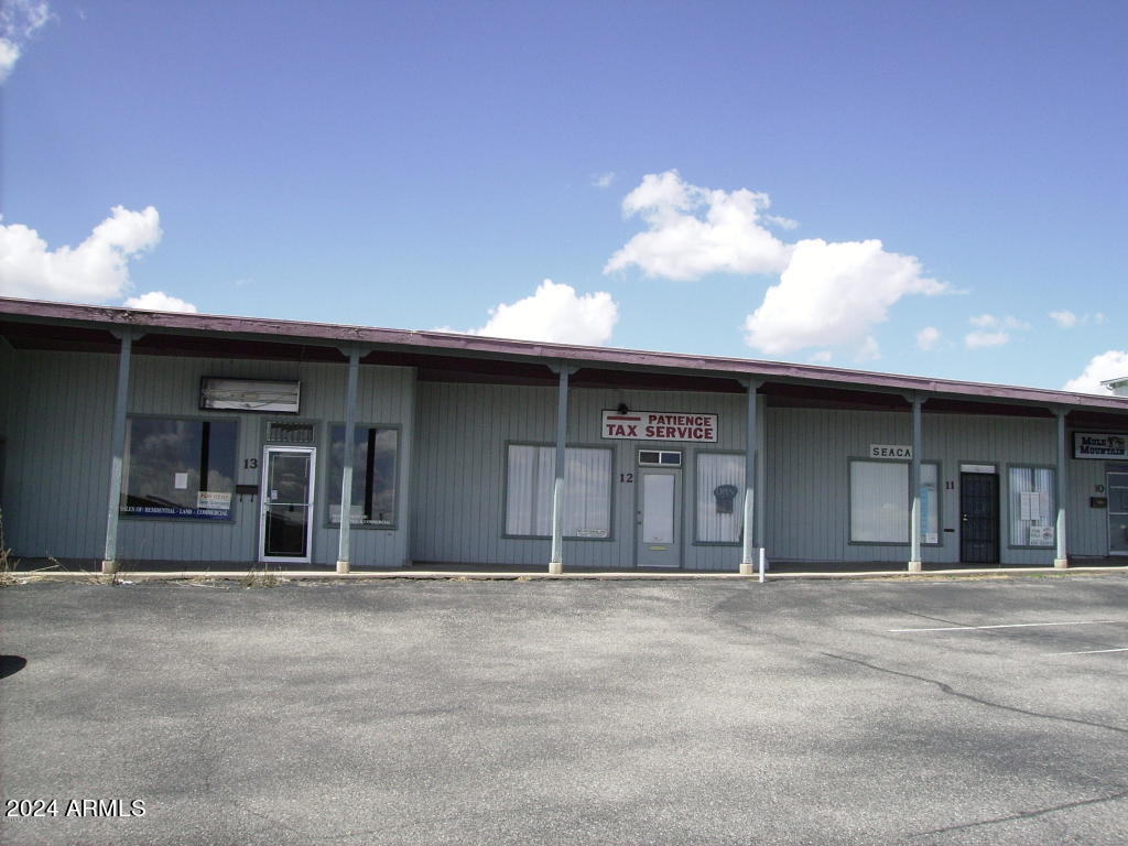 Near the Brian Terry Border Patrol Station, Cochise County Services Center, American Legion. Same center as Electric Brewery, VFW and mental health facility. Located in a Commercial Condo Association. They take care of the parking lot and landscaping and building exterior. Community septic system. Owner will carry on purchase. One owner is a licensed real estate broker in AZ.