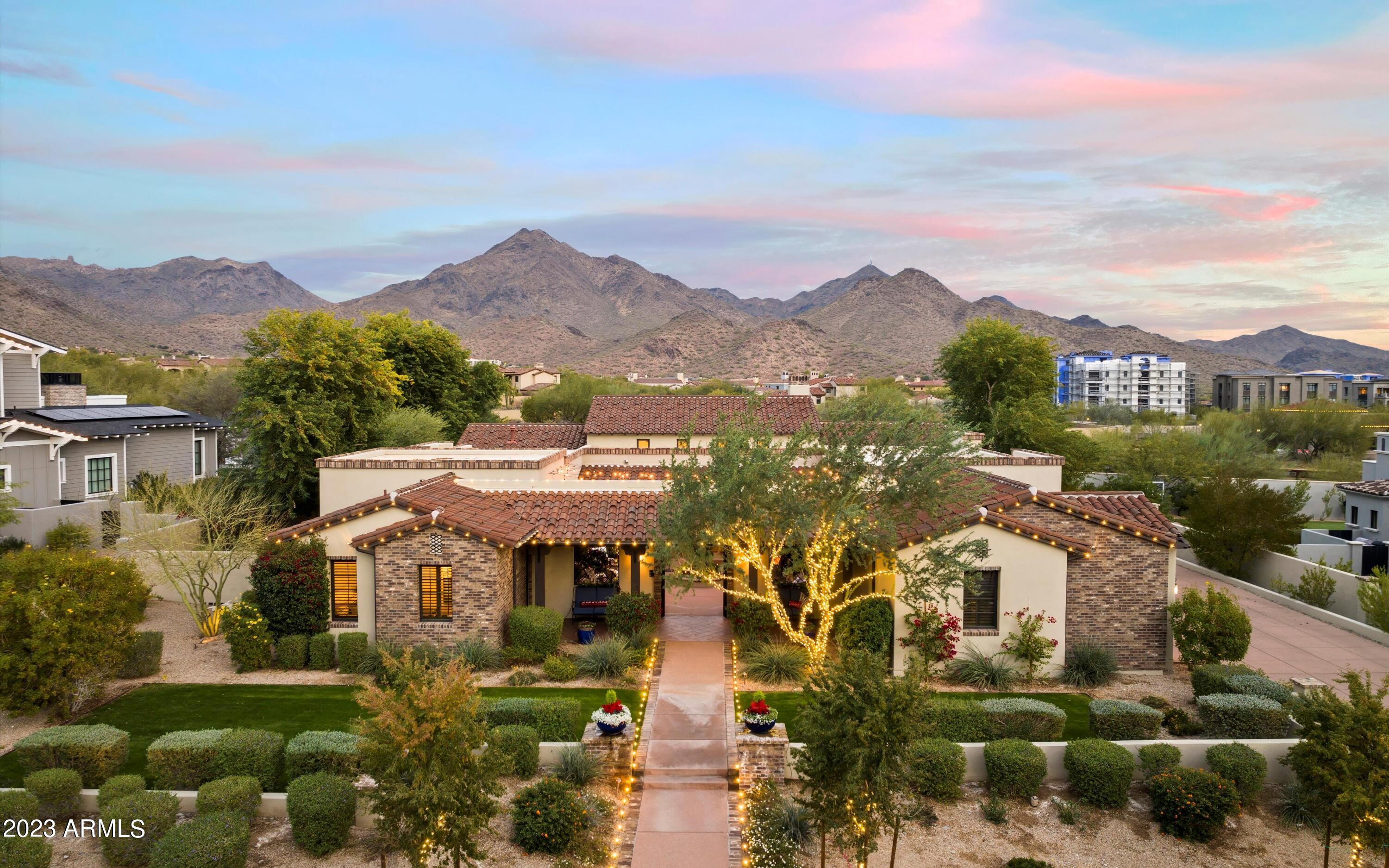 Welcome to Single Level Living in Silverleaf Arcadia - From its Interior Courtyard and Unobstructed Mountain Views, this Light and Bright, Open Indoor/Outdoor Floorplan, High Ceiling residence showcases an attached Guest Casita, Bar Room/Second Office, Rec Room, Double Kitchen Islands, Resort Style Grounds,  Built-in BBQ, Grassy Play Area, Mature Trees for Shade, Ramada, Pool/Spa, Protected Mountain Views, within a Guard Gated Community with Multiple Parks and Trails throughout the community.  The Clubs, Restaurants, Sporting Activities, Community Parks, Schools, Hiking Trails and DC Ranch Market street plus AJ's fine food store is all here. SEE MOTION VIDEO