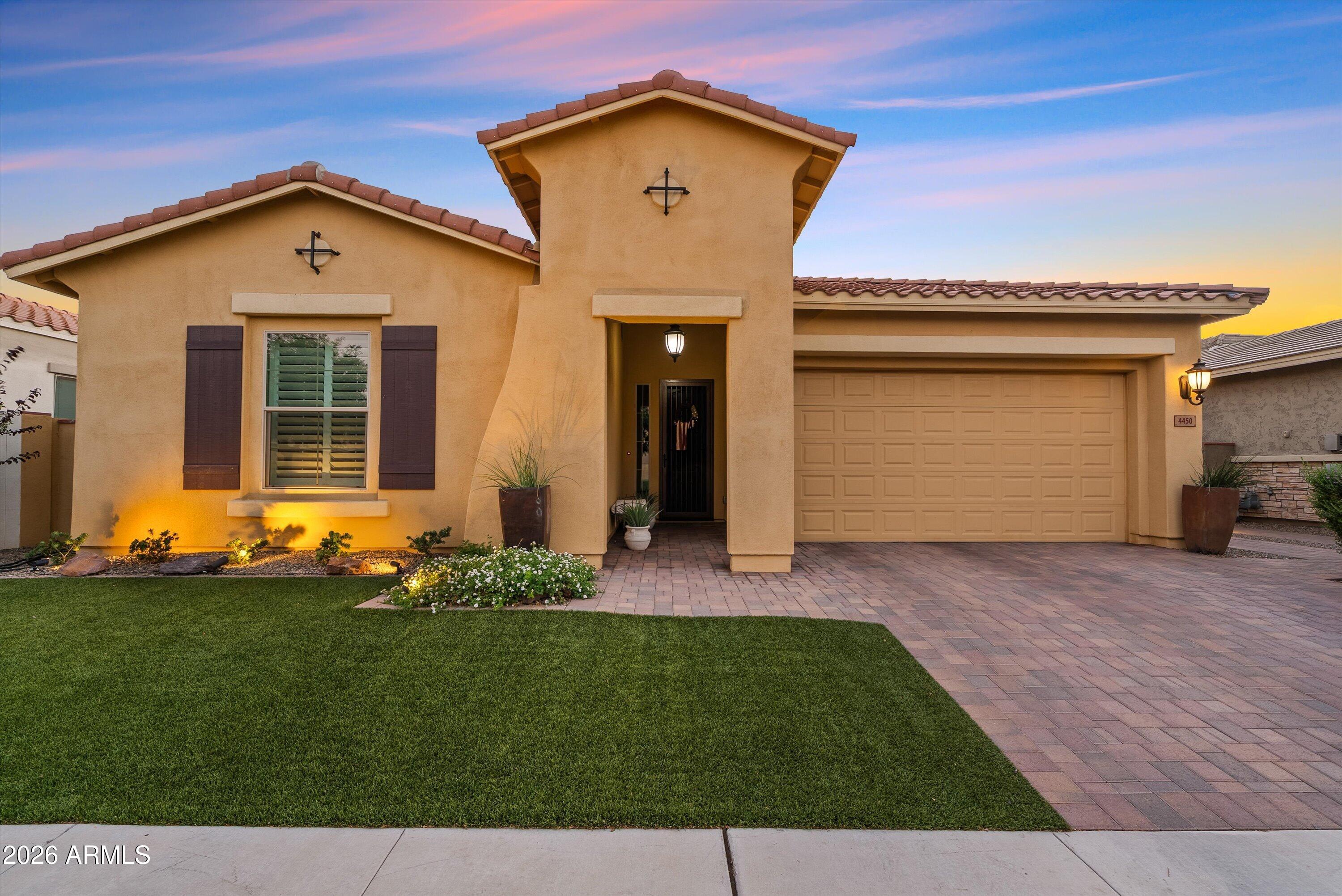 Welcome to one of Eastmark's most desirable gated David Weekley neighborhoods, where larger homesites, beautiful architecture, and an elevated sense of community make this one of the most sought-after places to live.

The backyard is what truly sets this home apart. Thoughtfully designed for both entertaining and everyday enjoyment, this outdoor retreat offers the perfect blend of beauty, privacy, and functionality. An extended patio and built-in misters create an inviting outdoor living space that's perfect for entertaining or relaxing while enjoying an Arizona sunset. With a sparkling and refreshing pool this backyard was designed with you in mind. This is the kind of space that truly becomes an extension of your home. Inside, the open concept layout creates effortless flow between the living, dining, and kitchen spaces, while abundant natural light fills the home.

Custom wood beams add warmth, character, and architectural charm to the sun room and flex space, creating a welcoming space that feels both timeless and inviting. The living room has a custom designed reclaimed wood focal point that adds warmth to the home. Every room has been designed with comfort and connection in mind.

Living here means more than owning a beautiful home. It means enjoying everything Eastmark has to offer, from community events and neighborhood parks to miles of walking paths and resort-style amenities. Combined with the quality craftsmanship David Weekley is known for, this home offers a lifestyle that's hard to replicate.

If you've been searching for a home with an incredible backyard in one of Eastmark's most coveted gated communities, this is your opportunity.