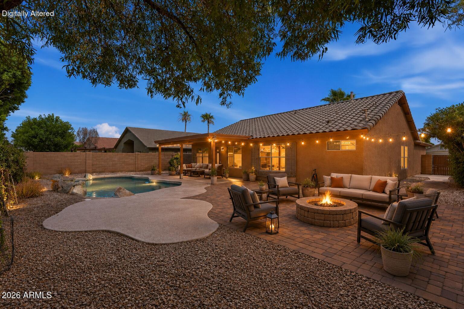 Welcome to this move-in ready 3 bedroom, 2 bathroom Chandler home with a versatile den and approximately 1,713 square feet of living space. Set kitty-corner to a large greenbelt, the property enjoys added privacy and effortless access to outdoor recreation. Inside, fresh paint and newer appliances create a bright, updated feel. The flexible den works well as a home office, media room, or potential 4th bedroom. The primary bedroom is generously sized, and two additional bedrooms offer ample closet space. Outside, the backyard features an in-ground pool, a large entertaining yard, and a covered patio, ideal for relaxing or hosting gatherings. All of this in a prime Chandler location close to freeways, shopping, dining, and entertainment.