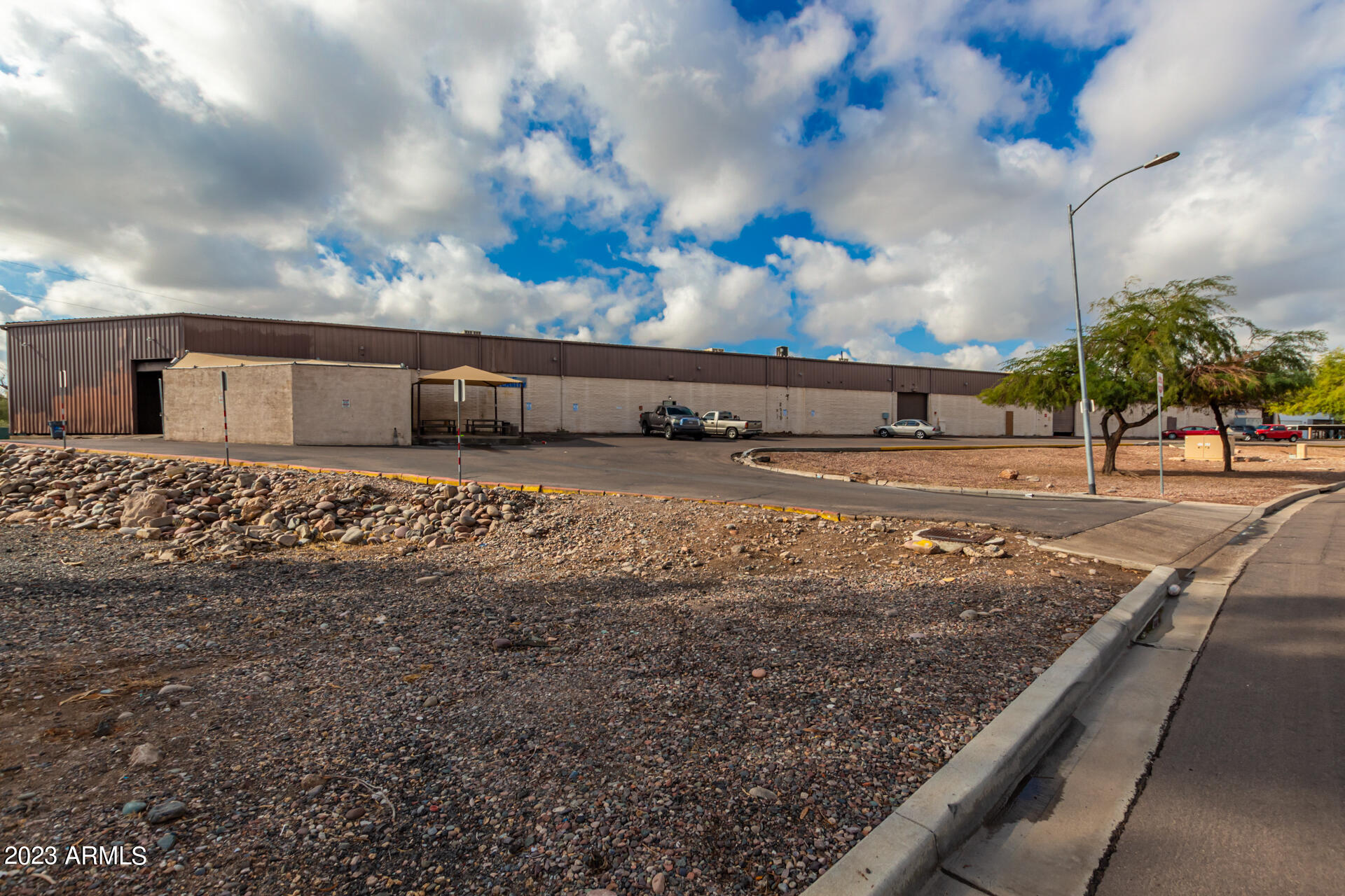 BACK ON THE MARKET 2/26/24 - Great location just south of downtown Phoenix ** Former manufacturing facility with lots of power (2,000 amp PLUS 1,200 amp) ** Eight dock high doors and three grade level roll-ups (two 12 ft and one 14 ft) ** Small office/kitchenette ** Storage shed plus two covered sheds **