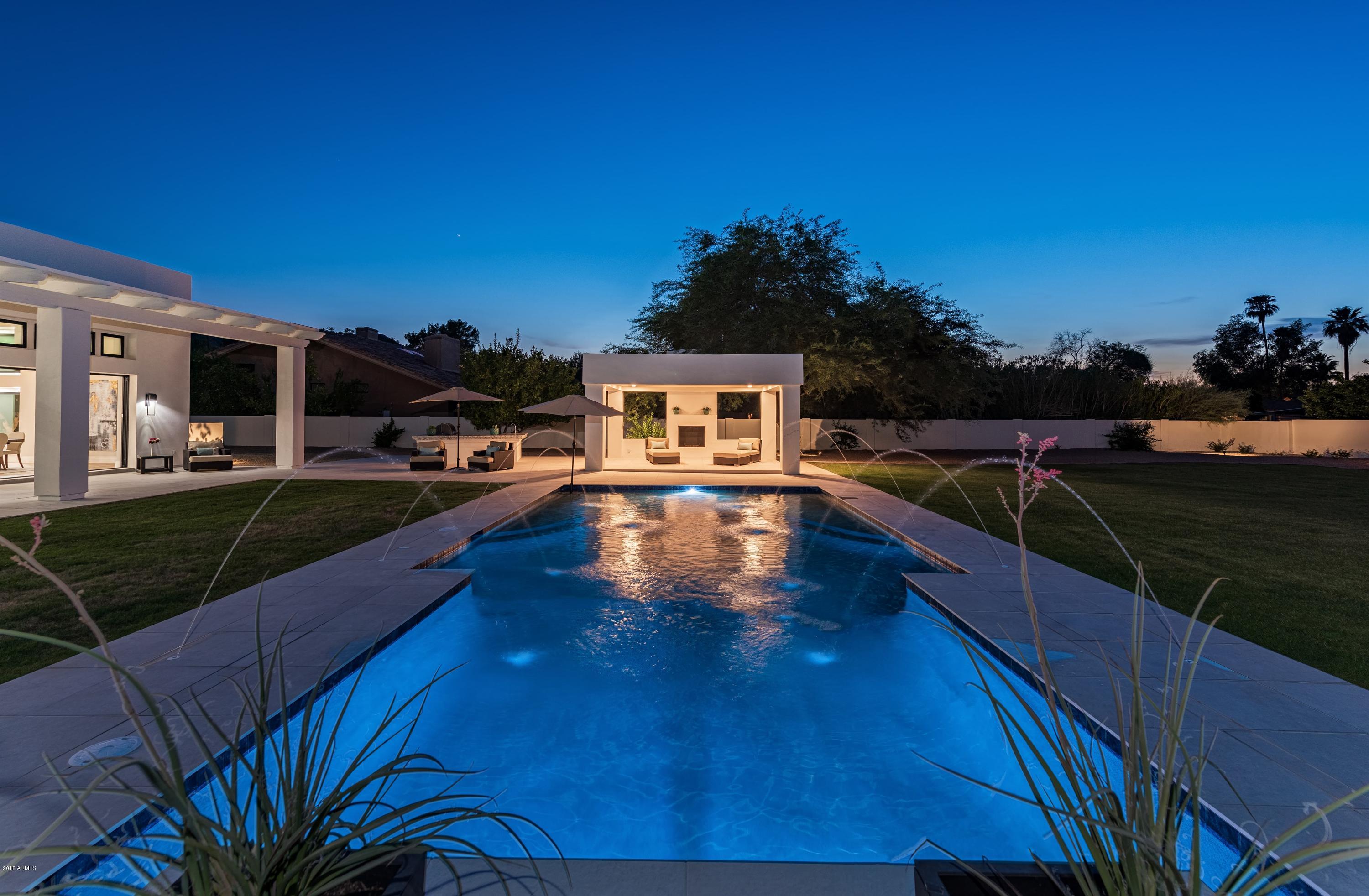 Prime location in the heart of Paradise Valley. Cheney Ranch Estates which is adjacent to Morning Glory estates is one of the most coveted destinations in all of AZ. Beautiful tree lined streets, grassy front yards, mountain views, minutes to championship golf, world class resorts and 5 Star dining. This stunning 6400 sf, 5 bedroom, 7 bathroom home just finished construction. Not a detail missed in this modern style country farmhouse. Locals would call it classic ''Arcadia''! Truly an entertainers floor plan with a massive kitchen, family room and dining area that opens to the back patio and yard through the 18' Heritage pocketing doors. 3 en suite bedrooms down the guest wing. 5th bedroom/office on the master side. Master bath PERFECTION!  Large lot allows for future guest house.