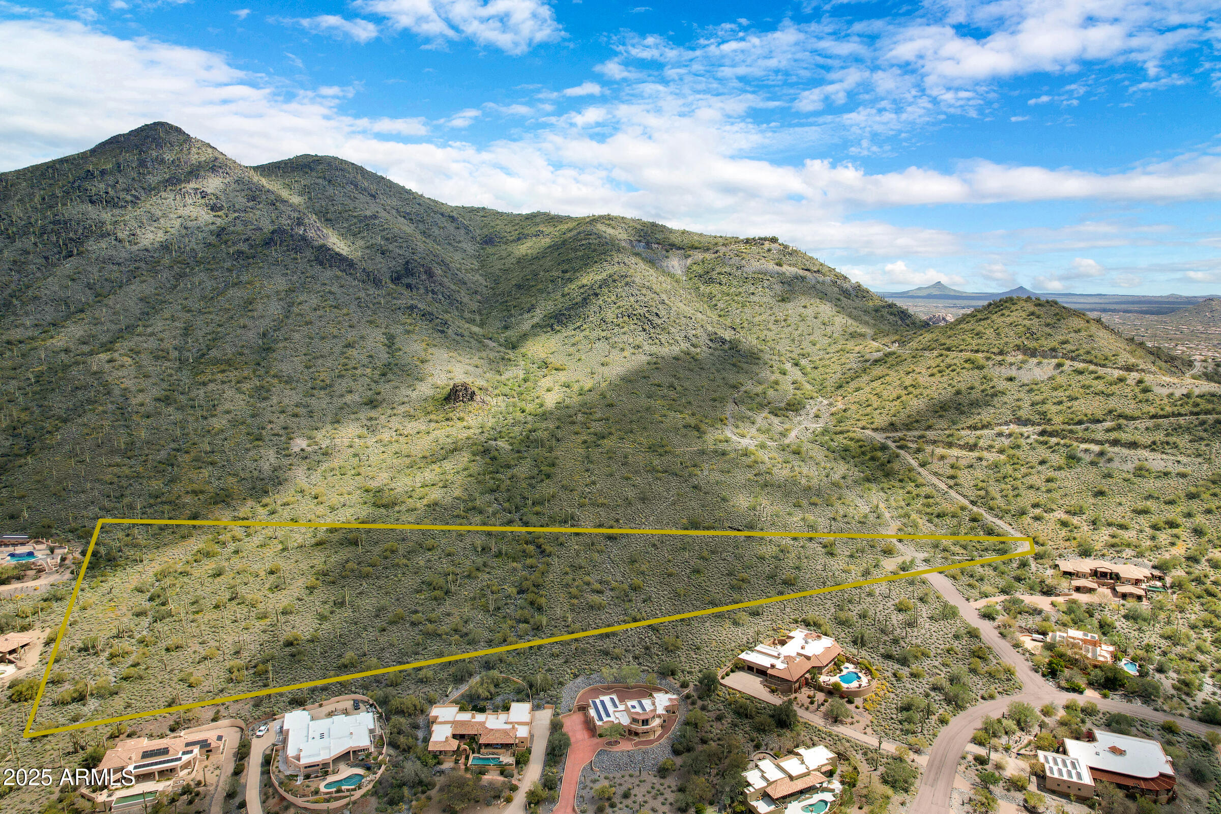 Welcome to Black Mountain Vistas 9+ ACRES of spectacular views. Property is subdivided into 5 buildable lots! Develop and build on this dream property elevated above the end of Sentinel Rock Road and backs to Black Mountain. The incredible 360 views, hundreds of soaring Saguaro cactuses sprawling the entire property with views in every direction make this property one of a kind. 9.14 total Acres, 7 individual Parcels and 5 Buildable Lots. Parcels include a private road for all 5 Lots and a common utility parcel. 5 Lot sizes are as follows: 1.98 acres, 1.46 acres, 1.21 acres, 1.56 acres, 1.77 acres Don't miss out on this property!