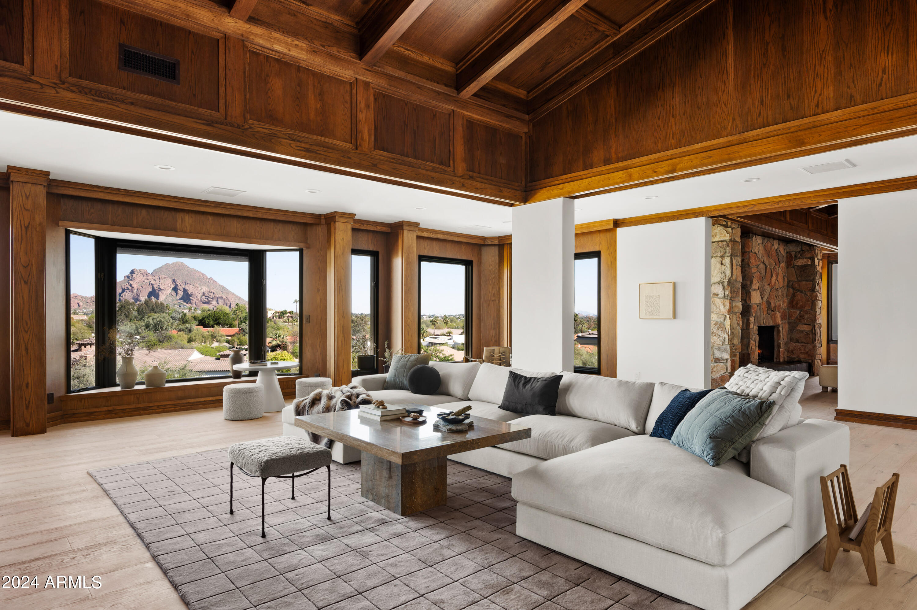 Step into this reimagined masterpiece crafted by the valley's preeminent builder MDF Development, led by renowned designer Lauren Wallace, and prepare to be captivated by sweeping panoramic vistas of Camelback Mountain. This remodeled home seamlessly blends the charm of yesteryears with modern elegance, boasting three spacious bedrooms and 3,5 baths. The fusion of old-world craftsmanship and contemporary sophistication renders it unparalleled in the market. Majestic vaulted beamed ceilings grace the living areas, while four fireplaces infuse warmth and allure throughout. Delight in morning repasts in the revamped kitchen/breakfast room, enveloped by bay windows offering intimate views of Camelback Mountain. The expansive primary suite is a tranquil retreat, complete with a cozy... fireplace and a stunning remodeled bathroom boasting unparalleled mountain panoramas. The open-concept kitchen, featuring mesmerizing Camelback views, further enhances the allure of this exceptional abode.

New Roof
New Tile
New AC
New Wood Floors
New Sub Zero Appliances
New can lighting
New Countertops
New Hardscape and Landscape