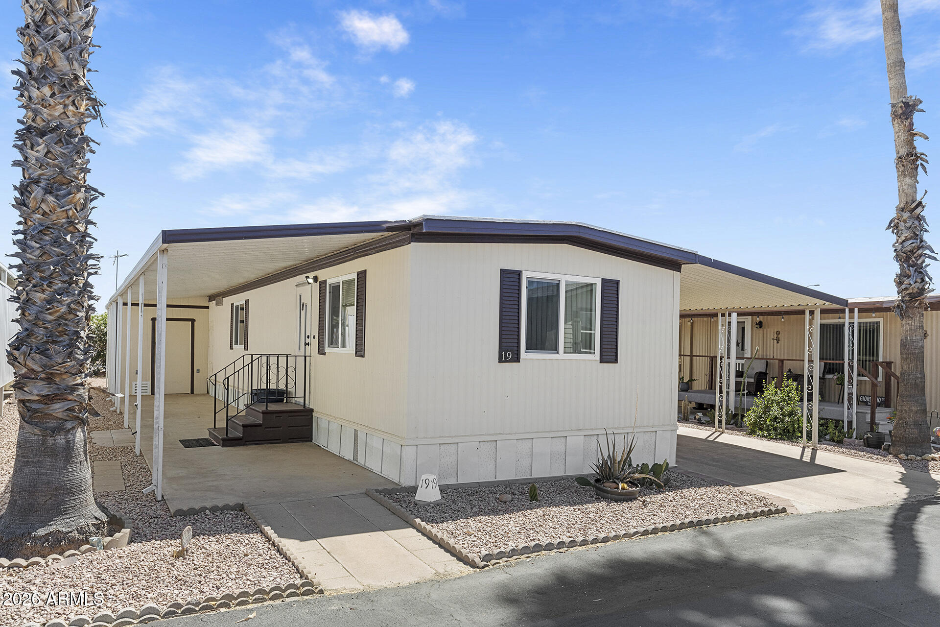 Affordable, move-in ready living with scenic views - welcome home! This charming 2-bedroom, 1-bath mobile home is located in a gated Active Adult community and offers beautiful mountain views right from your doorstep. Well-maintained and ready for its next owner, the home includes a refrigerator, washer, and dryer for added convenience. Outside, you'll find a storage shed and two covered carport spaces. Enjoy a welcoming community with amenities such as a clubhouse, pool, and fitness center, perfect for relaxing and staying active. Whether you're looking for a full-time residence or a low-maintenance retreat, this home offers comfort, value, and lifestyle!