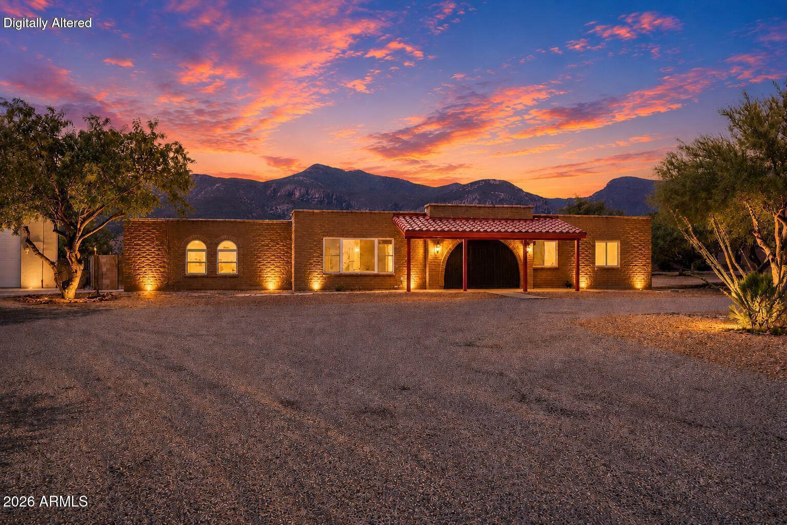 Fantastic corner-lot property situated on over an acre, offering space, flexibility, and energy savings with assumable solar. This 3 bedroom, 2 bath home features two expansive living areas, including a converted attached garage that serves as a bonus room or theatre room, home office, gym, or any hobby space. Step outside to enjoy exceptional outdoor living with a sparkling pool, above ground spa, private covered porch, and plenty of open space for recreation, animals, or future improvements. The detached garage with oversized doors is thoughtfully divided into two functional spaces, with front half designated for spacious parking and the rear currently set up as a game room. Which could provide another large entertaining space complete with mini-split and a covered patio of it's own. All of this makes for remarkable possibilities.
With room to spread out and endless potential, this unique property offers the perfect blend of comfort, function, and fun. Don't miss this one.