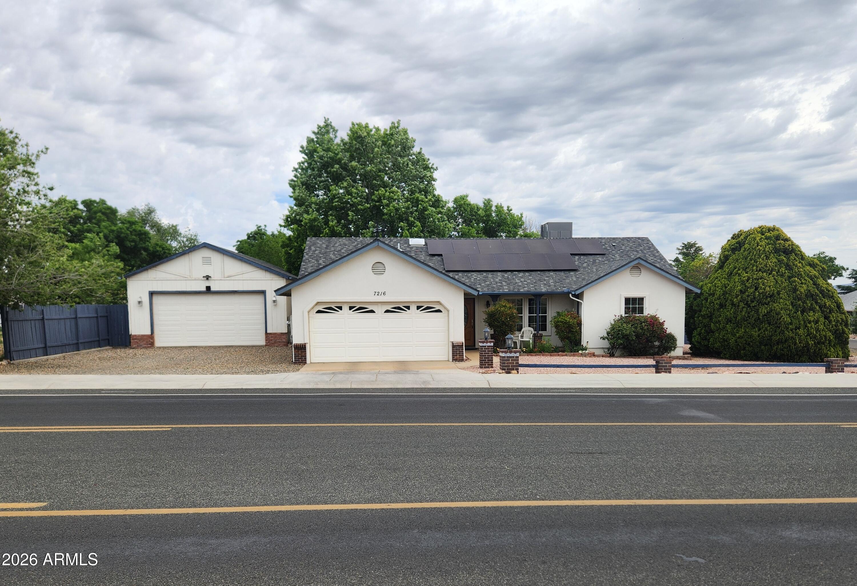 Well maintained, centrally located 3 bedroom/2 bath 1374sf home with enormous detached garage--what a great space for workshop, hobby area, outdoor toys, cars, storage and more!  That's in addition to the attached 2 car garage!  Upgraded tile flooring in the great room and bathrooms, renovated kitchen and guest bathroom, new stucco and exterior paint 2018, new roof and new HVAC 2019, new water heater 2025.   Fully fenced backyard oasis--great for entertaining, gathering with family and friends includes covered patio, large grassy area and two beautiful shade trees. Nearby amenities include Bob Edwards park, shopping, entertaining, medical and services.