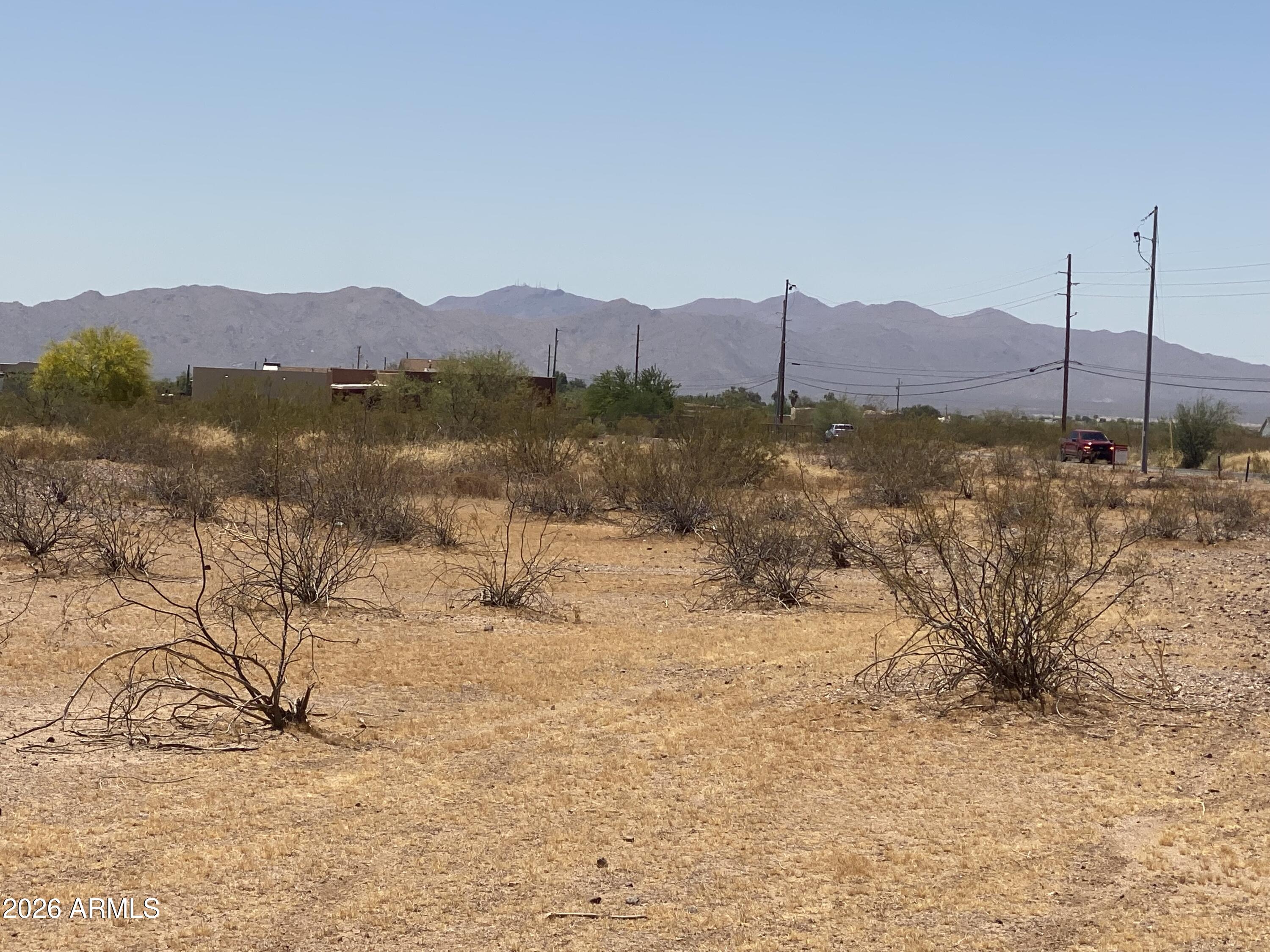 Two parcels with combined acreage of approximately 8.93 acres sold together located in fast growing, unincorporated area without HOA restrictions. Corner lot, paved on two sides for easy access. Metered water available from West End Water Co. 12'' water lines run along property on Center Street and on Crozier Rd.. Currently zoned one home per acre (RU-43). May be suitable for commercial or mixed-use potential subject to approvals. Minutes to freeway, shopping, dining, and services. Ideal for custom home, small home builder, or land  investment.  Horses welcome; plenty of room for a barn, arena, etc. Ample space for workshop/ RV/boat parking/ guest house or ADU.