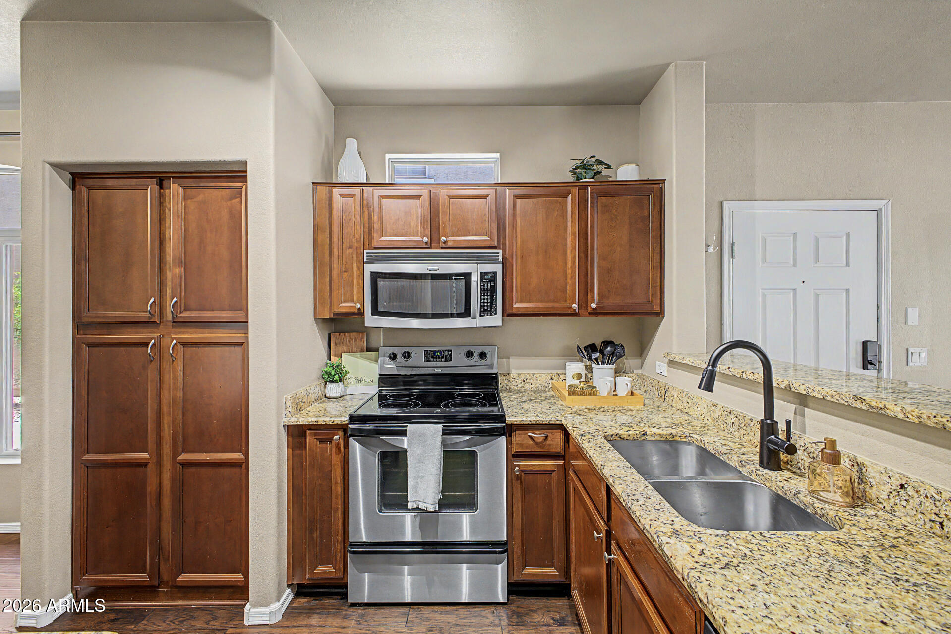 Welcome to this beautifully maintained 3-bedroom, 2.5-bath home in desirable Gated Villagio at Tempe! Across from Cubs stadium, near all shopping! 

Located on the quiet side of 280 S Evergreen with abundant guest parking, this home offers an east-facing orientation for morning sun without the intense afternoon heat. Enjoy a private backyard with no neighbors directly behind. 

The HOA covers exterior maintenance, roof, blanket insurance, and exterior pest control. Updates include a high-efficiency 16 SEER A/C ( 5 years old), newer water heater, granite countertops, and refreshed downstairs flooring in 2025. 

Pride of ownership and consistent maintenance throughout! This one is the right one for you and your family. 2 Car garage and fresh backyard for you to imagine with pavers and