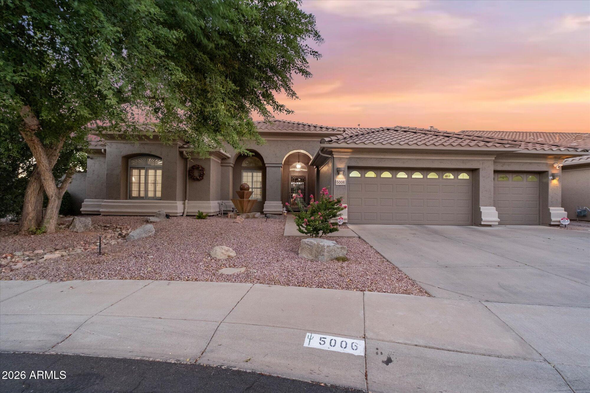 Discover the perfect blend of luxury, space, and functionality in this exceptional home with no neighbors behind, abundant natural light throughout, and beautiful mountain views. Designed for flexible living, this home features an expansive repainted full basement, and a bonus room. The gourmet kitchen showcases Sub-Zero & Wolf appliances, an oversized island, and extended cabinetry. The spacious primary suite offers dual closets, bkyd access, and a beautifully updated bath (2021). Enjoy an extended-depth garage with built-in cabinets and a new hot water heater (2026). Outside, unwind in the resort-style bkyd with a beach-entry pool, mature citrus trees, updated irrigation (2025), and storage sheds. Located near Loop 101, SR-51, Mayo Clinic, Scottsdale Quarter, top-rated schools, & more!