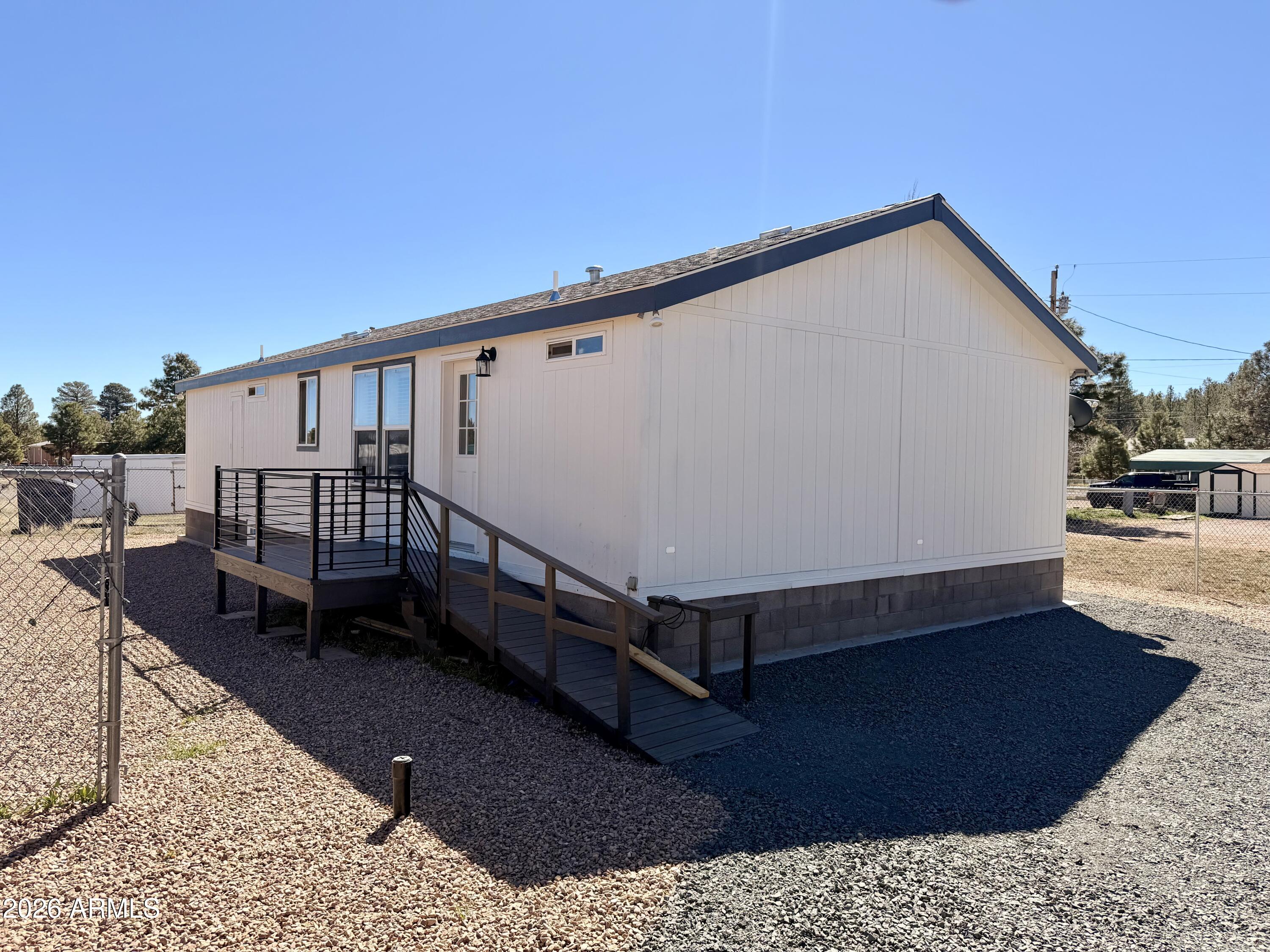 Updated 2018 manufactured home in Heber-Overgaard! This 3 bedroom 2 bathroom home features 1344 sq feet of living space. This home has been updated with fresh interior and exterior paint, new carpet and a new gravel drive! Take a look at this home today for your next retreat in the White Mountains!