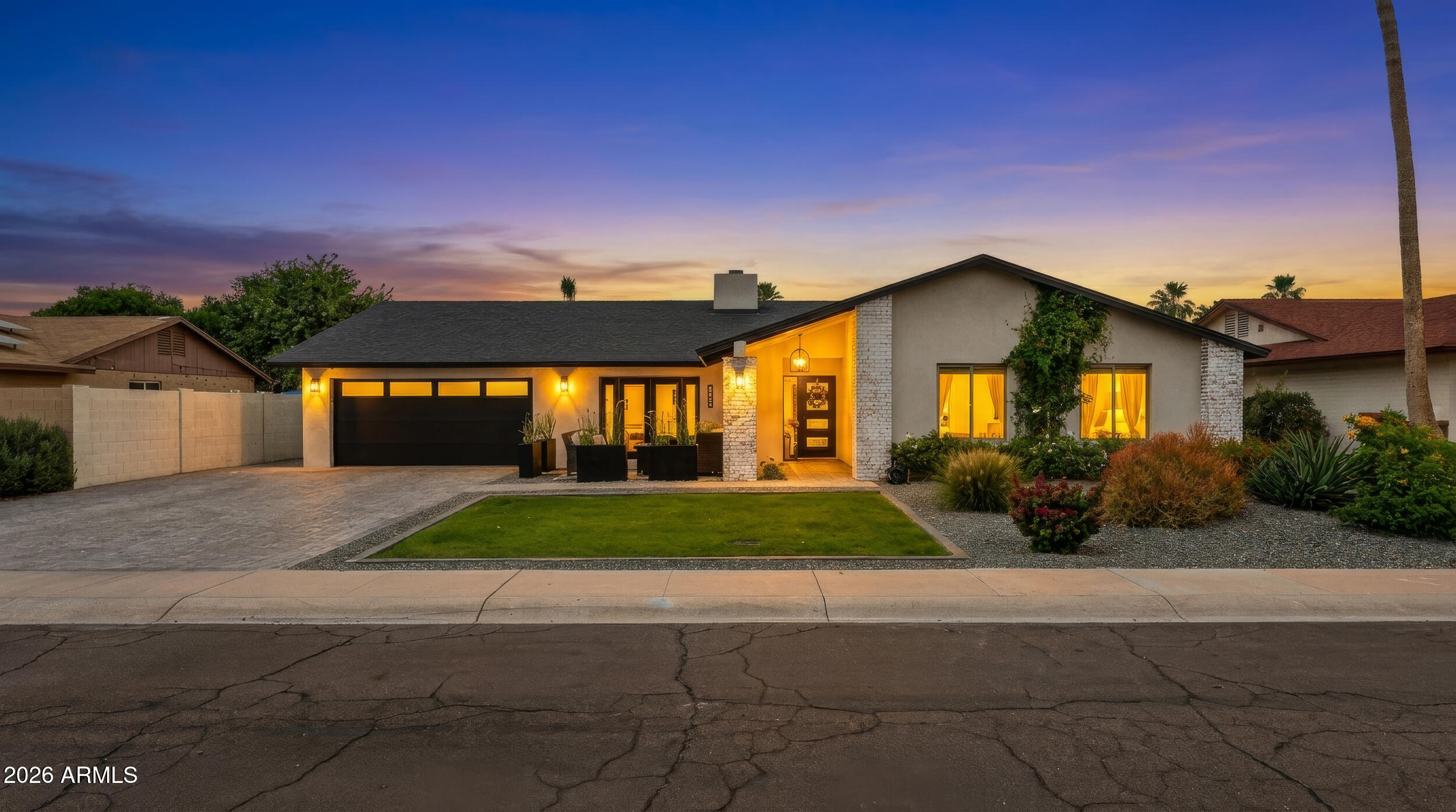 Fully remodeled and dialed in, this 85260 stunner with no HOA is the one buyers wait for. Set on a quiet cul-de-sac, this 4 bed, 2.5 ba home makes an immediate statement with vaulted ceilings, abundant natural light, and standout curb appeal with a welcoming front paver patio. Inside, the open-concept layout is built to impress--quartz counters, sleek vinyl flooring throughout, and a striking two-way fireplace that anchors the space. Major upgrades are already done with a new roof and HVAC. The primary suite delivers with a large walk-in closet, dual sinks, and a beautifully tiled shower. Finished with a 2-car garage with epoxy floors and a prime location near top dining, shopping, schools, and easy freeway access--this one stands out.  The Murphy bed will convey.