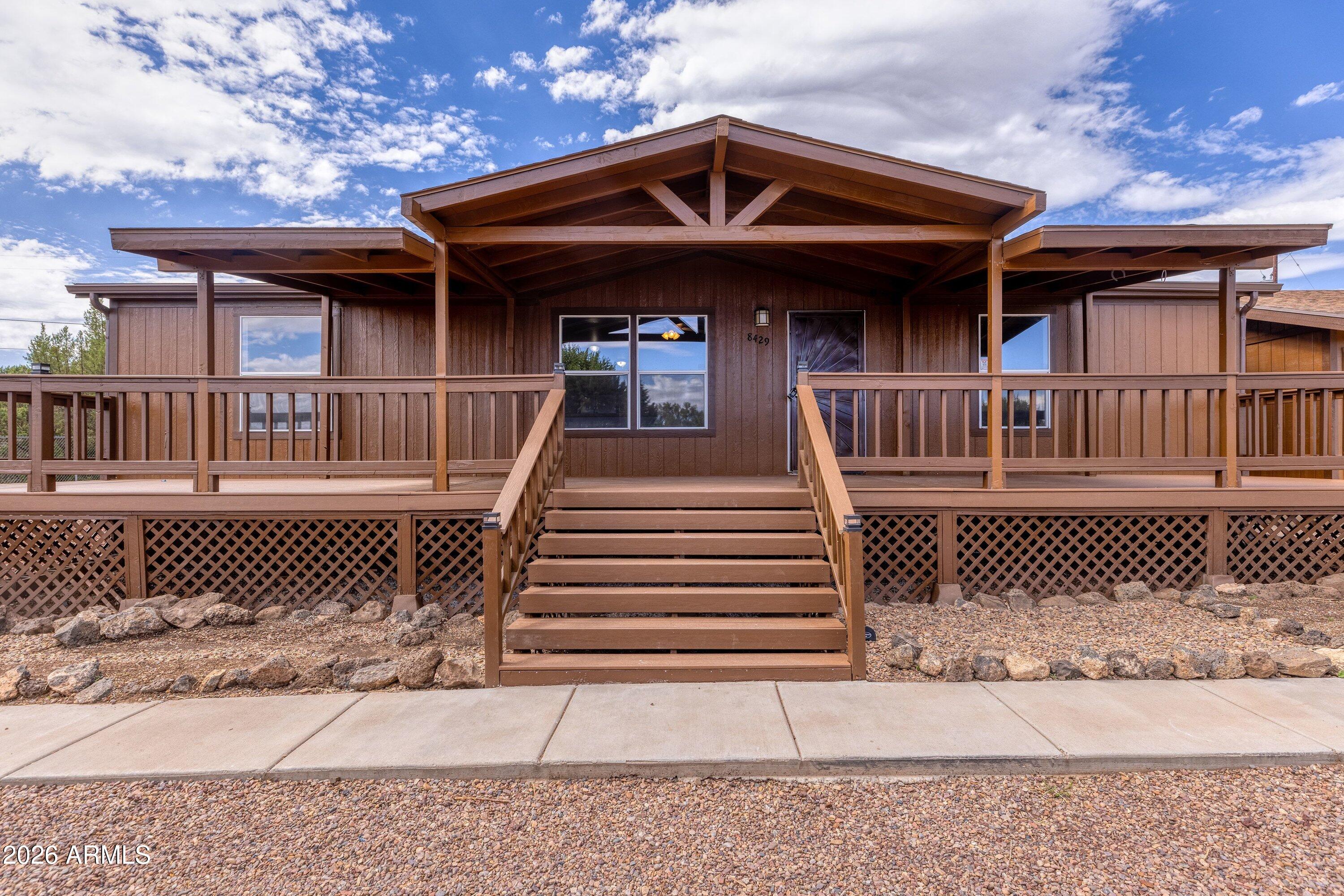 8429 Pinon Drive, Show Low, AZ 85901 - 

Freshly updated and move-in ready, this charming White Mountain Lakes home offers the perfect blend of comfort, space, and mountain lifestyle living.

Situated on a spacious 0.46 acre lot, this thoughtfully refreshed property welcomes you with new flooring, fresh interior paint, and fresh exterior paint, creating a bright and inviting atmosphere from the moment you arrive.

Inside, you'll appreciate the functional split-bedroom floor plan, generous living spaces, and flexible layout designed for both everyday living and entertaining. The open-concept flow provides a comfortable setting for gathering with family and friends, while the additional family room offers endless possibilities for a game room, media room, home office, or hobby space. Step outside to enjoy the fully fenced yard, RV gate access, storage buildings, and ample room for outdoor activities, gardening, pets, and recreational vehicles. The detached 2-car garage provides convenient parking, additional storage, and space for tools, hobbies, or outdoor gear. Enjoy unwinding on the front porch, crafted with new Trex decking.

The oversized, fully fenced lot offers privacy and flexibility rarely found at this price point. The yard features established table grapevines and blackberry bushes, plus multiple fruit trees: apple, almond, cherry, plum, and peach!

As a resident of White Mountain Lakes, you'll enjoy exclusive private lake privileges, including fishing, kayaking, boating, water skiing, and picnic areas.

Located near Birdie Ranch Golf Club and just minutes from shopping, dining, and amenities in Show Low, this property offers the ideal combination of recreation and convenience.

Whether you're searching for a full-time residence, mountain getaway, retirement retreat, or investment opportunity, this move-in-ready home delivers exceptional value and the relaxed lifestyle that makes Arizona's White Mountains so desirable.

Property Highlights:
" Fresh interior paint
" Fresh exterior paint
" New flooring
" Split-bedroom floor plan
" Spacious family room
" Attached 2-car garage
" Double lot
" Fully fenced yard
" RV gate access
" Storage buildings
" Private lake privileges
" Near Silver Creek Golf Club
" No HOA
" Move-in ready condition

Experience four seasons, endless outdoor recreation, and small-town mountain charm in this beautifully refreshed White Mountain Lakes home.