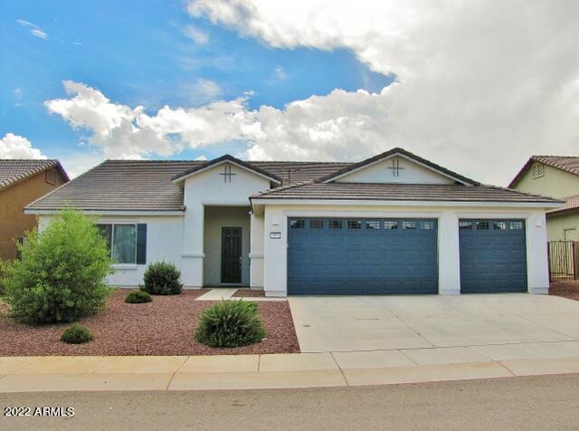 This 2021-constructed, 4BR+den/2BA/3CG, 2405 sq. ft. property in the Holiday subdivision is centrally located in Sierra Vista, AZ minutes from Ft. Huachuca, shopping, schools and Canyon Vista Medical Center.  The open floor plan includes a spacious family room and modern kitchen with black S/S appliances, quartz counters, apron sink, bay windows and a sliding glass door to the covered patio. There's a bonus room which can be used as a den, formal dining room or study/den. The master en-suite has a large walk-in closet, shower, garden tub and quartz double vanity. The private back patio overlooks the open desert with views of the Huachuca mountains.  Call today!