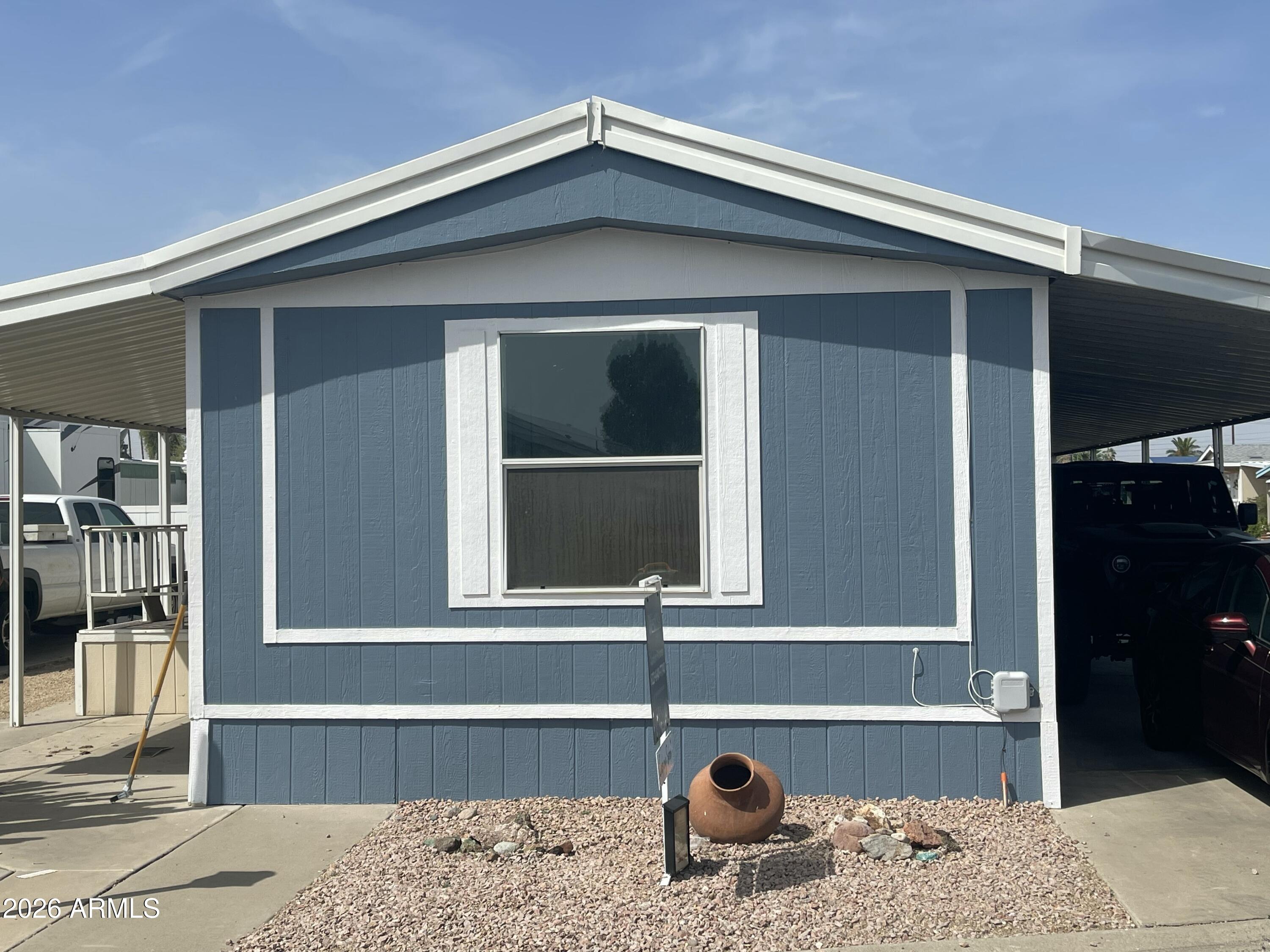 ON LEASED LAND:

Don't miss out on this absolutely stunning remodeled 2 bedroom 2 bath 1997 Redman manufactured home.  Primary bath has custom walk in shower.  Primary bedroom features walk in closet.  2nd bedroom has entrance to hall bath.  Kitchen is elegantly updated with added kitchen island.  Updated lighting throughout.  Front porch to enjoy your morning beverage. Private Fenced area for your fur babies.  Roof only a few years old, ac just updated. 
1 Year home warranty.  


Located in highly sought after Casa Del Sol West, a 55 plus age restricted gated resort style community.  Featuring pool, spa, billiards, putting green fitness, laundry.  Lots of activities.