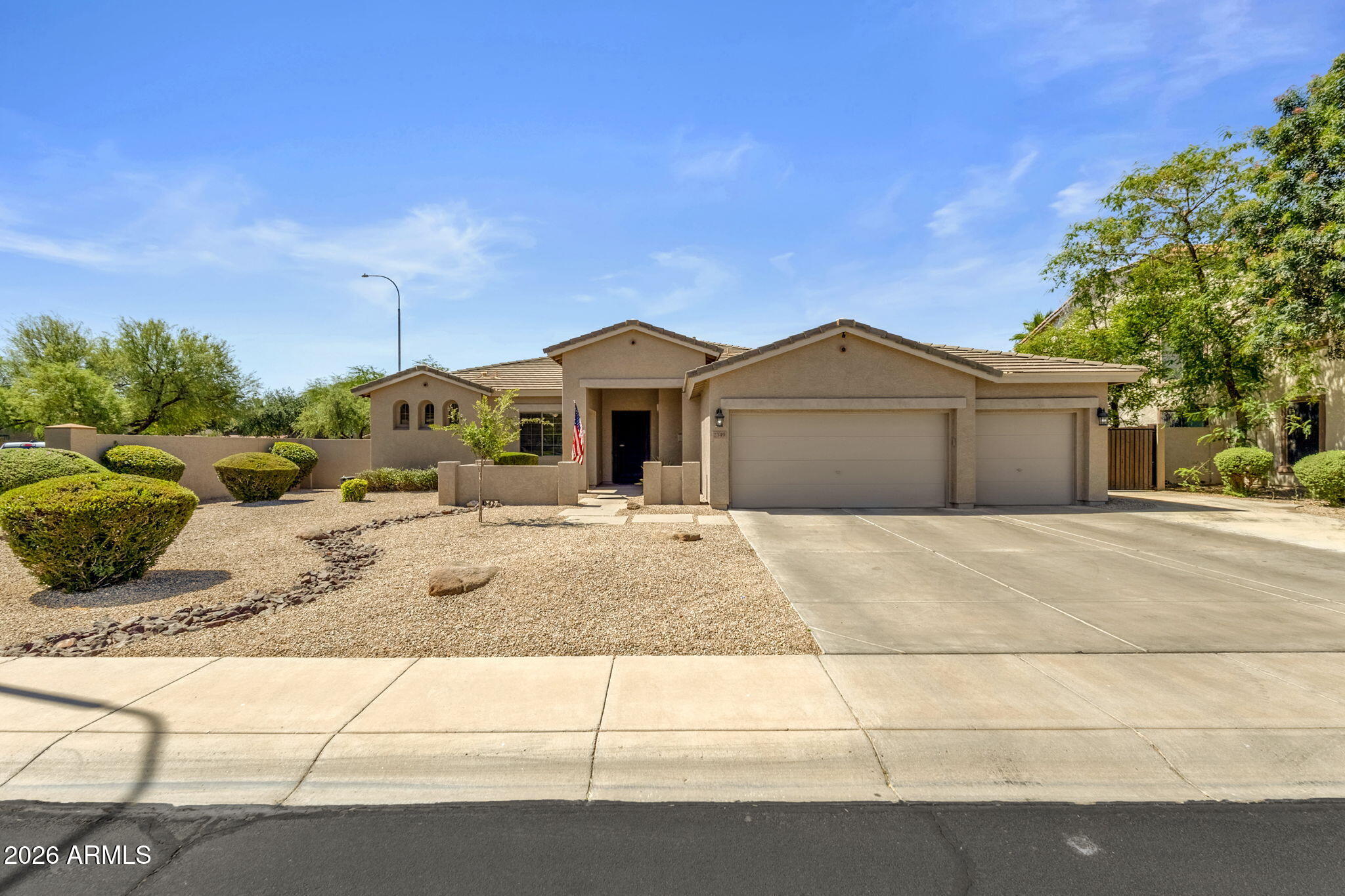 Located in the highly sought-after Fonte Al Sole community, this beautifully maintained Shea Home offers a sprawling 3290 square feet of thoughtfully designed single-level living on a premium 12,000+ square foot north/south-facing corner lot. With 5 bedrooms, 3 full bathrooms, a split floor plan, and exceptional indoor/outdoor living spaces, this home perfectly blends comfort and functionality.

A formal living and dining room greets you upon entry, offering views of the backyard oasis and an ideal setting for entertaining. The spacious eat-in kitchen is equipped with abundant cabinetry, an oversized island, stainless steel appliances, a dedicated pantry, and a convenient built-in tech station. Opening seamlessly to the family room, the layout creates a warm and inviting gathering space- the heart of the home.

Privately tucked away, the spacious primary suite offers direct backyard access along with an ensuite bath featuring dual sinks, a large soaking tub, separate shower, and an oversized walk-in closet. On the opposite side of the home are four additional bedrooms and two full bathrooms, including a secondary ensuite bedroom with its own walk-in closet -- perfect for guests or multi-generational living.

Recent updates include exterior paint, new window treatments, and updated pool equipment! 

Designed for enjoying Arizona living year-round, the backyard features a sparkling pool, travertine decking, artificial turf, and multiple areas for lounging and outdoor dining. A 3-car garage and oversized side gate provide plenty of room for additional storage, recreational vehicles, or outdoor toys.



Ideally located near shopping, dining, parks, and top-rated schools, this exceptional home offers the perfect combination of space, comfort, and convenience in one of the area's most desirable neighborhoods.