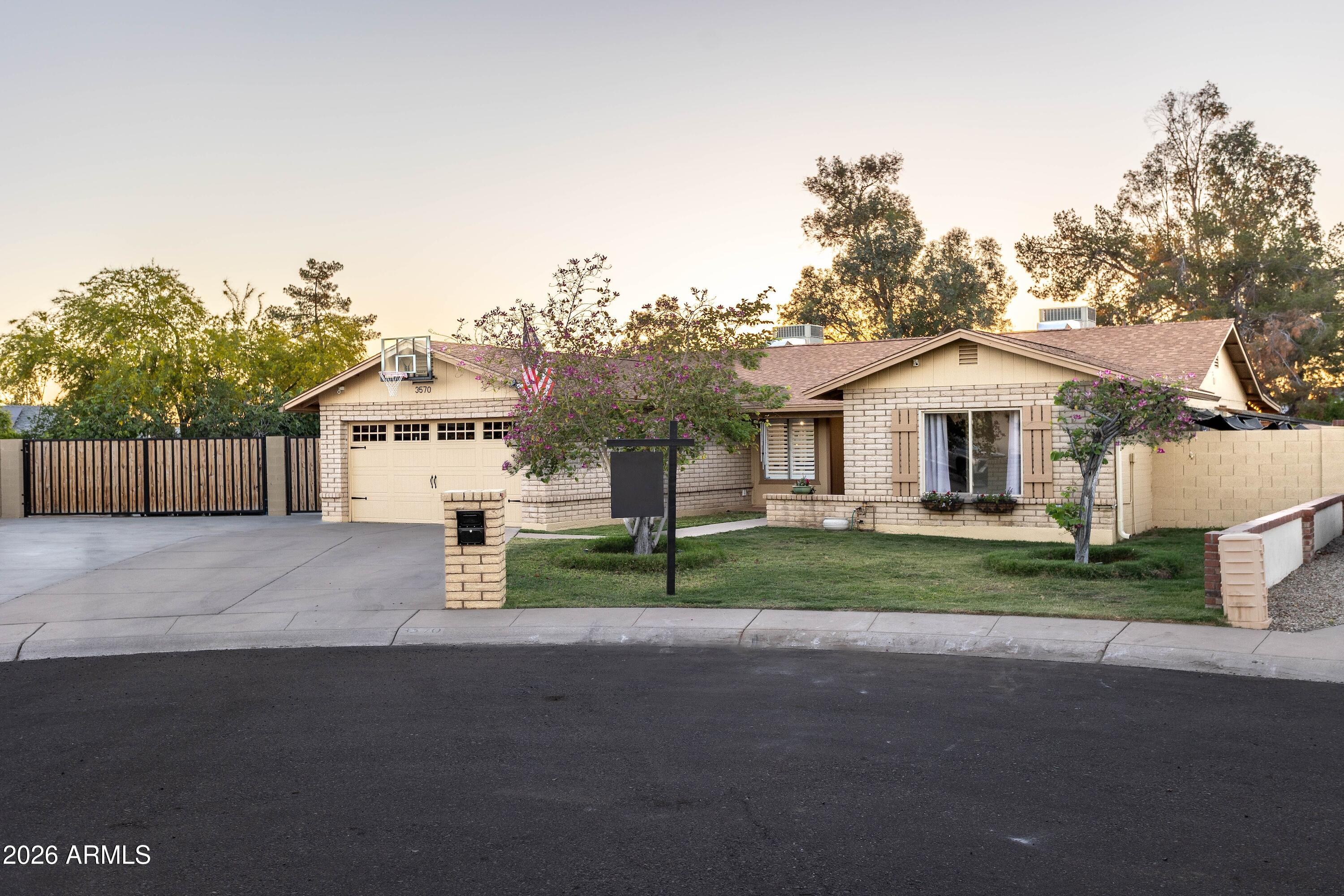 Full of character, this updated Phoenix gem sits on a large corner cul-de-sac lot with no HOA and room for all your toys. Enjoy an RV gate, two storage sheds (one with electrical), a variety of tropical fruit trees, raised garden beds & a chicken coop already filled with laying hens! Inside, you'll find a spacious bonus room, updates throughout and peace of mind with both the roof and AC replaced in 2023, and newly installed carpet in the bedrooms. The light & bright, fully remodeled kitchen features double ovens, soft close kitchen drawers, leathered soapstone countertops, and a pot filler, perfect for the home chef.  Outside, the extended covered patio overlooks the spacious yard and pool with Baja shelf, ideal for relaxing, gardening, entertaining, or simply soaking in Arizona evenings.