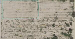 Enjoy the tranquility of desert living on this spacious 1-acre lot in the sought-after Harquahala Ranches community of Tonopah, AZ. This buildable lot is ideal for a custom home, offering panoramic mountain views and a peaceful environment away from city noise. Accessible via a county-maintained dirt road, the property also includes an easement at the back for future water line access (water meter not installed). With no HOA restrictions, you have the freedom to create your dream space. Just 17 miles from the freeway, this lot offers the perfect blend of seclusion and accessibility. Don't miss this incredible opportunity