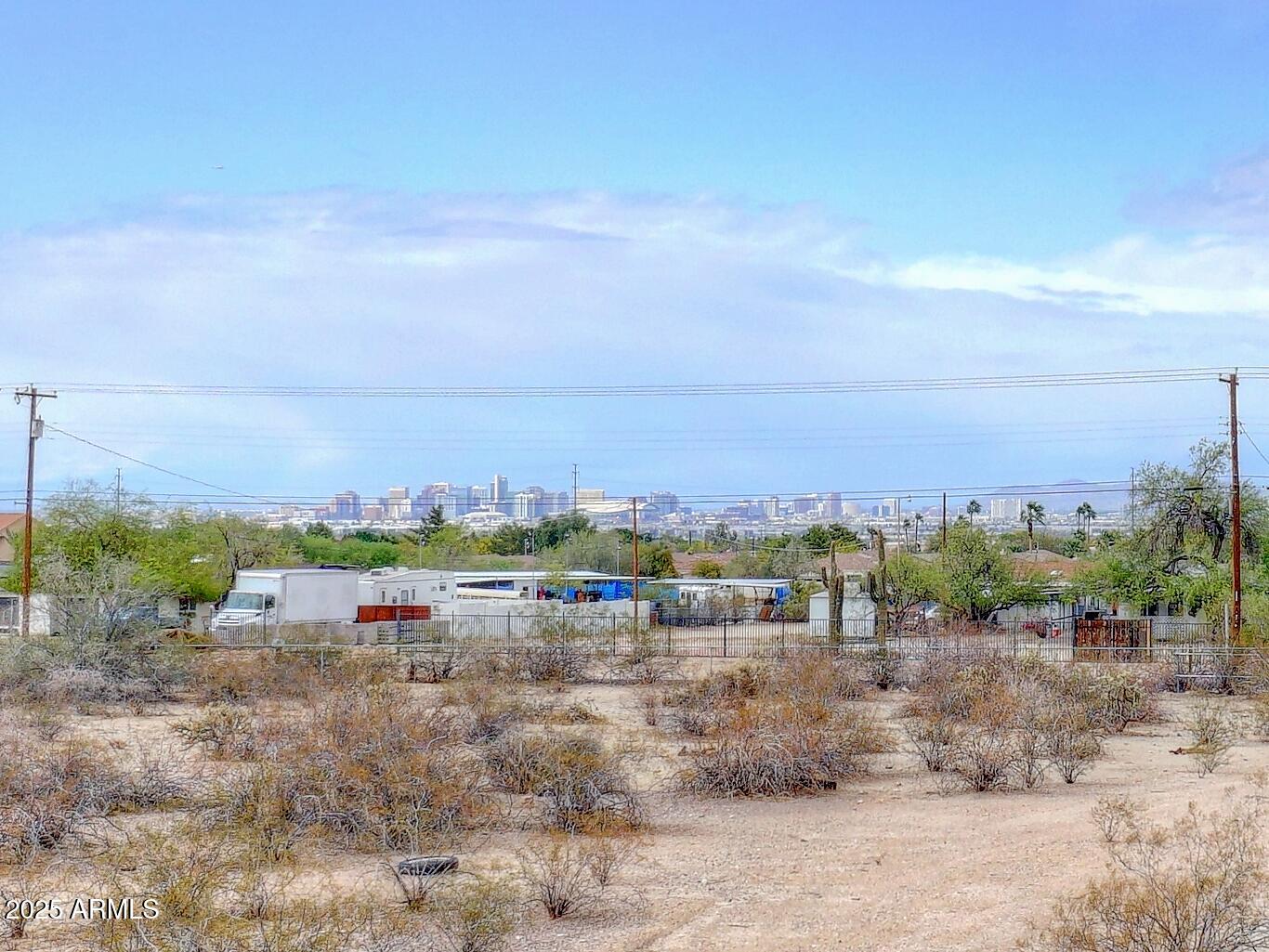 REDUCED FOR QUICK CLOSE! CALLING ALL INVESTORS/DEVELOPERS/BUILDERS! This is the plot of land you have been looking for~nicely settled close to the base of South Mountain! Gorgeous views of the mountain range & also amazing views of downtown Phoenix skyline on other side! 4.36 acres with access from 2 main streets (South Mountain Ave., & Desert Ln). Dwelling Unit Density is R-3 Multi-Family, allowing for up to 65 dwelling units (Buyer to verify). Water & Electric already on the property. City sewer nearby/easily accessible. NO HOA. Come build ''dozens of the prettiest little homes you ever saw''. GREAT LOCATION-less than 5 miles to I-10, 15 mins to Sky Harbor Airport, 20 minutes to downtown PHX. Walking distance to shopping, dining, South Mountain Community College, beautiful hiking trails