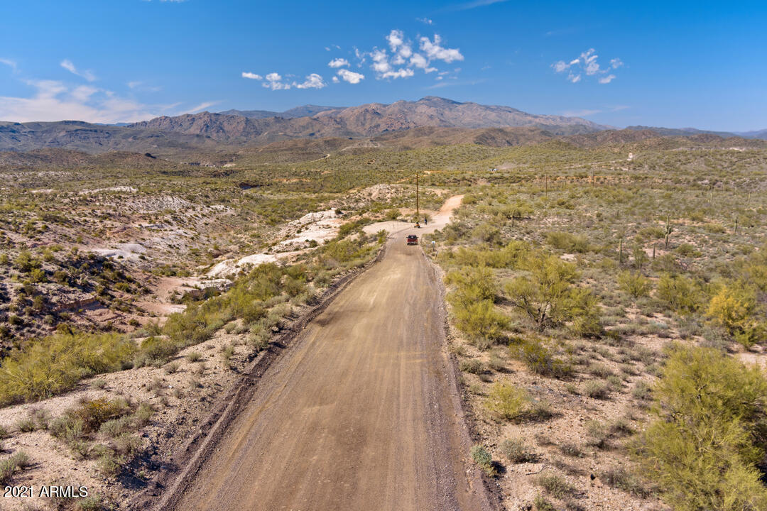 The Nugent Homestead has incredible views of the Bradshaw Mountain Range, Saguros, Palo Verdes, and Chollas. Located between Lake Pleasant and Rock Springs with 154 acres with Moores Gulch that flows into the headwaters of Agua Fría River. The area is a natural wonder with great potential uses as an entertainment venue, RV park, manufactured home park or subdivision with 130 lots outside of the Phoenix water AMA.

SEE ATTACHED DOCS FOR DUE DILIGENCE & OFFERING MEMORANDUM.

OUTSIDE OF THE PHOENIX WATER AMA BOUNDARY. WELLS IN THE AREA AT SHALLOW DEPTHS. 

I-17 WIDENING EXPANSION EXPLAINED
https://youtu.be/EbJNh2hlso0
https://youtu.be/qst6aqESXnY
https://youtu.be/uJ3h0pP5sYM