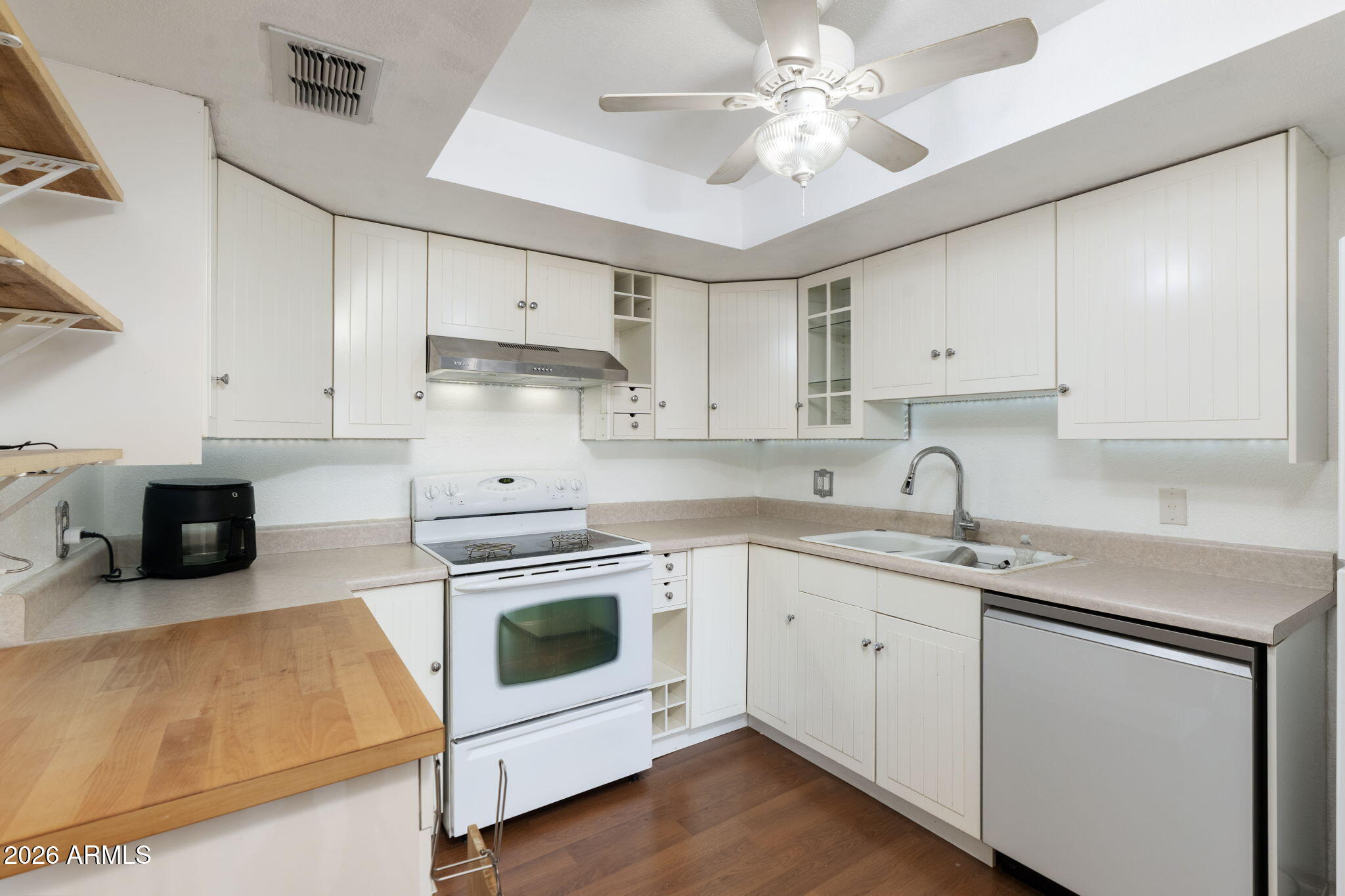 Beautiful and updated 2 bed 2 bath 1332 model with separate living and dining rooms! All dual pane windows, new steel front door, new light fixtures, new cabinet hardware, LED lighting, updated cabinets, new Samsung dishwasher and LG refrigerator, new fans, new crown molding and baseboards, freshly painted and updated flooring. The whole building has a brand new HVAC system (and owner has prepaid the $8000 assessment). Located on the 5th floor with beautiful views and on the same floor as the laundry, with 4x3 storage closet included. Scottsdale Shadows is one of the best and largest condo complexes in Scottsdale with a free 9 hole executive golf course, covered and uncovered pools, spas, workout room, tennis courts, and assigned underground parking. Scottsdale Shadows is private and quiet with 24/7 guarded access and air conditioning, water, and trash, are all included in HOA fees and the electricity bill is subsidized averaging around $75/month.