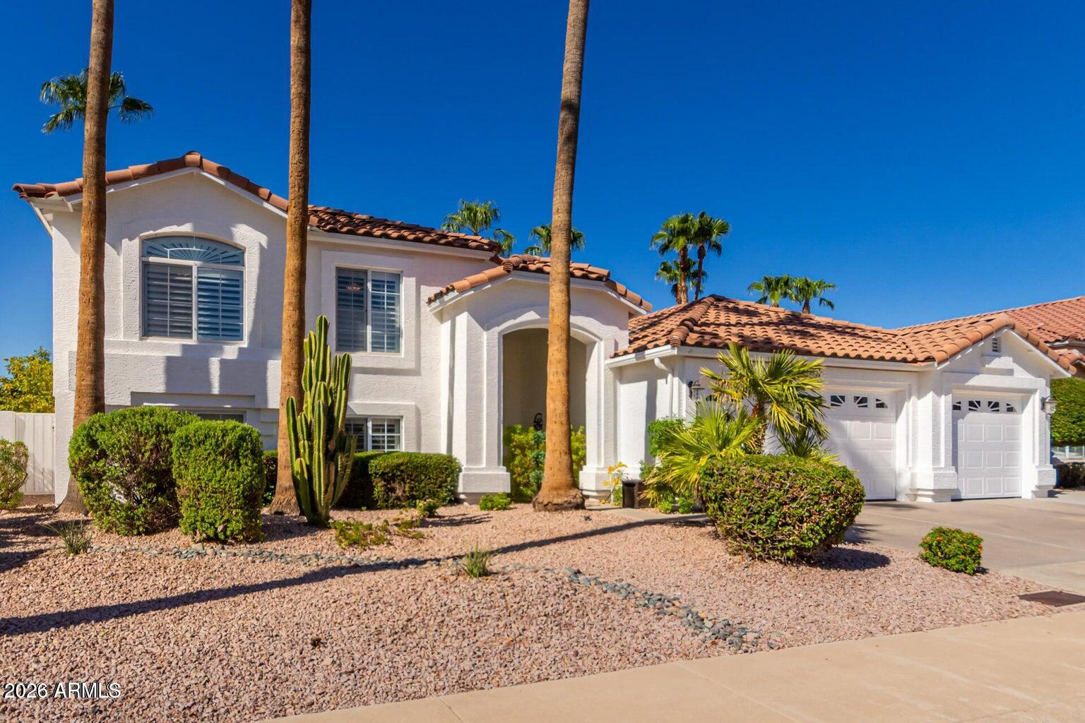 Feel like you're always on vacation in this luxury rental on the WATER! Rare 5 bdrm, 3 bath, 3-car garage home gives everyone in your family their own space! Enjoy life inside and out at this beautiful property w/RV gate, pool, spa & LAKE VIEWS. Gourmet kitchen boasts stainless steel appliances, granite counters, travertine backsplash, recessed & under-cabinet lighting, a skylight, plenty of cabinet space, island & breakfast nook. Comfortable living room & dining room w/ bay window showcases LAKE VIEWS. Second floor features the primary retreat w/ private balcony, ensuite bath with dual sinks, separate shower,jetted tub, & walk-in closet. 2 additional bedrooms & hall bath complete the 2nd flr. Lower level is perfect for multi-gen living w/flex room w/fireplace, 2 bedrooms, & full bath. Conveniently located down the street from Arrowhead Mall and Bell Road Shopping and Dining district! Close proximity to upscale amenities at Arrowhead Country Club including private Golf, Tennis, Swim and Gym facilities! Golfers' paradise with several local golf courses nearby! Less than a mile from Arrowhead Hospital and Phoenix Children's Hospital - Arrowhead Campus. Easy access to 101, Peoria Sports Complex, and Cardinals Stadium!
