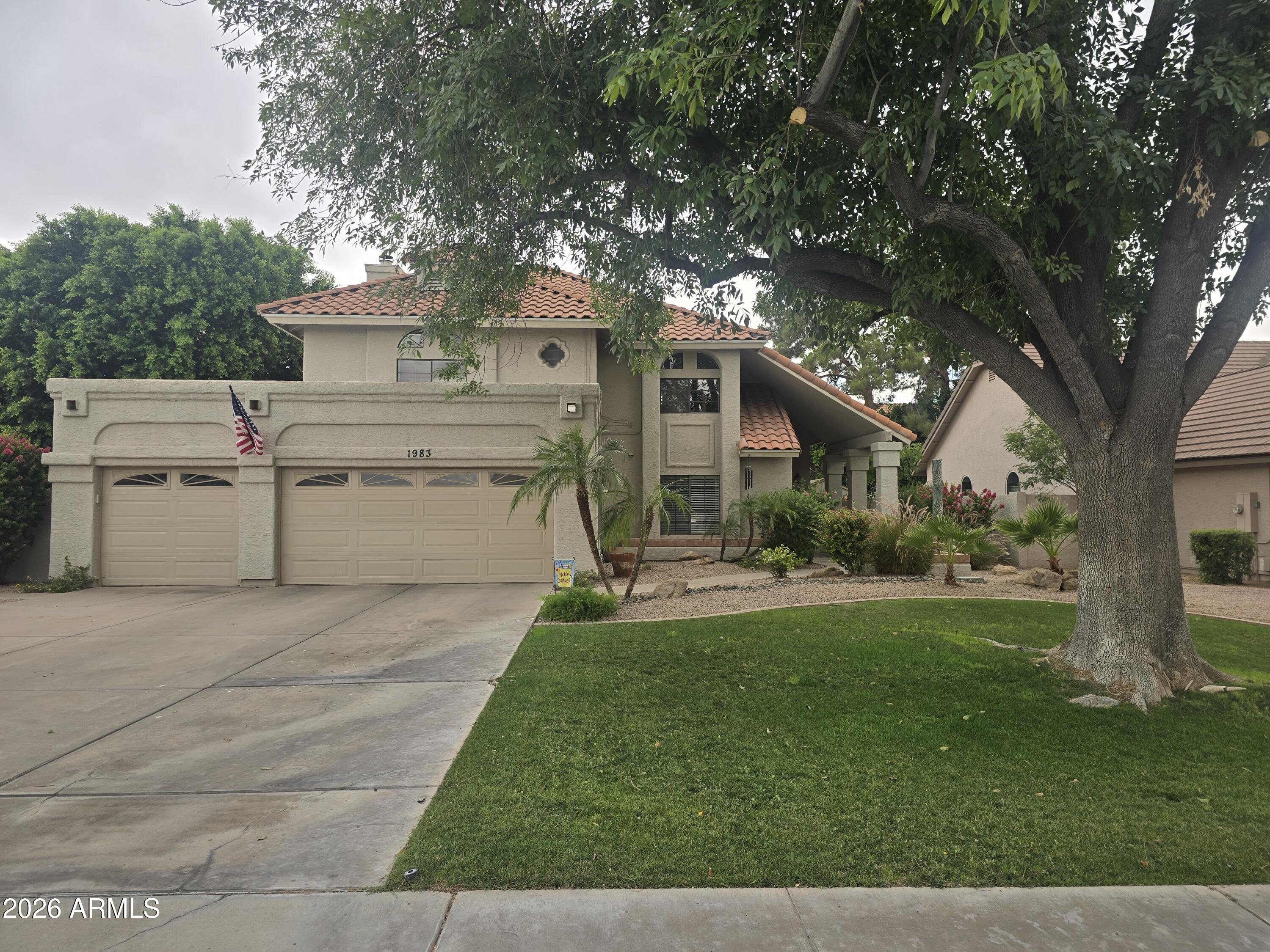 Welcome home to this beautifully updated residence in Estate Los Colinas. Designed for comfortable family living, it features a remodeled kitchen with custom cabinetry, premium Café appliances, and quality craftsmanship throughout. Rich hardwood floors enhance the main living areas, creating a warm, elegant atmosphere. The flexible floor plan includes a main-level bedroom and full bath, ideal for guests, a home office, or multigenerational living. Upstairs, the spacious primary suite offers a private balcony, while two additional bedrooms and a secondary bath complete the level. Enjoy the benefits of fully owned solar panels and no HOA fees. With its prime location, thoughtful upgrades, beautiful outdoor space, and exceptional value, this home is a rare opportunity.
